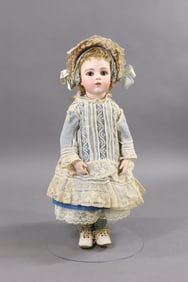 ANTIQUE FRENCH BISQUE HEAD DOLL.