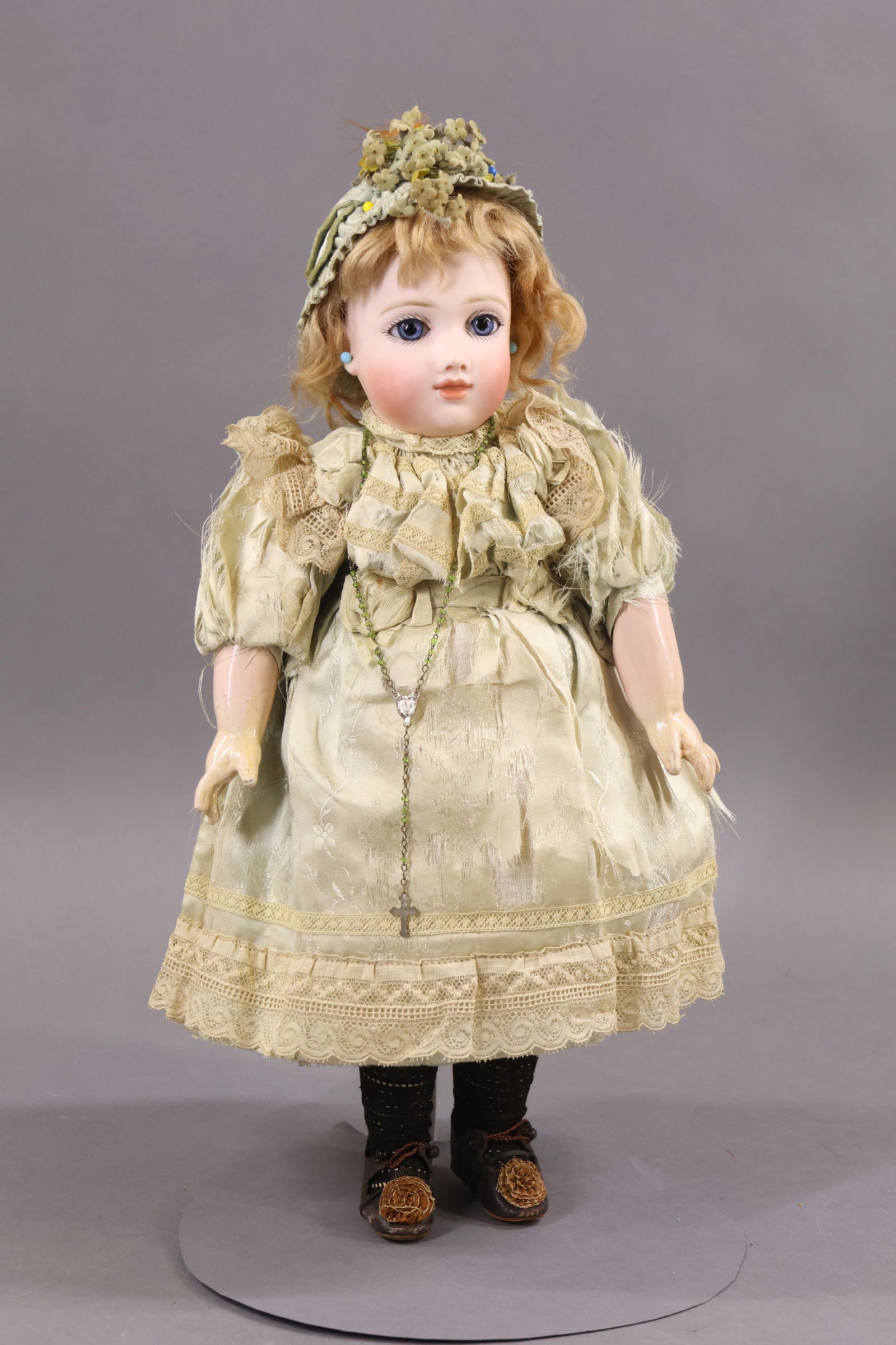 ANTIQUE FRENCH BISQUE HEAD DOLL.: 15" (Incised) A 7 T (A. THUILLER) Doll with blue paperweight eyes, closed mouth, pierced ears, honey blonde mohair wig, cork pate. Very clean papier mache jointed body is unmarked. Straight wrists. Dr