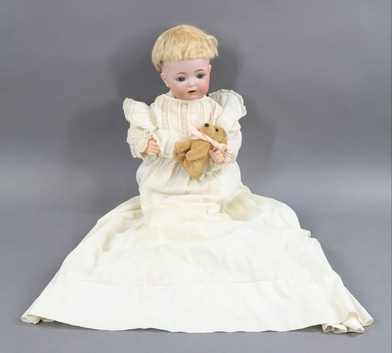 GERMAN BISQUE BABY DOLLS.: 14" K * R SIMON & HALBIG 121 36 character baby with blue sleep eyes, open mouth with woggle tongue, pale blonde mohair wig, plaster pate. 5 Pc. papier mache bent limb baby body with cutout on body, cr