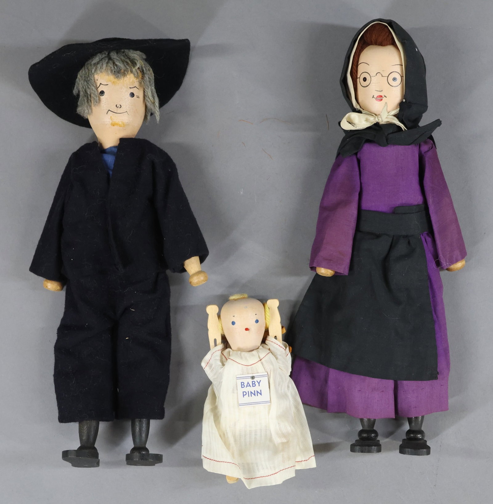 SCHOENHUT.: (3) Members of THE PINN FAMILY. 5 1/2" Tagged "Baby Pinn". 12" "Hattie Pinn". 12" "Pinn" (beard is missing). Condition: as stated. This lot is being sold AS IS.