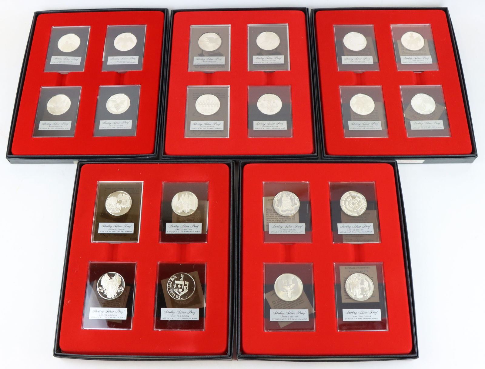 The Franklin Mint Sterling Silver Holiday Medals: The Franklin Mint sterling silver proof Holiday Medals, (5) boxed sets of (4) medals each, ranging from 1981 - 1987. (20) medals total. Each medal approx. 38 mm and 0.76 ozt. Overall approx. 15.2 ozt