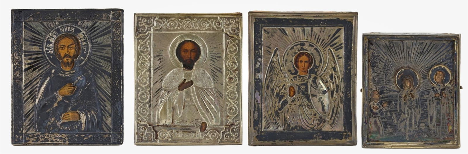 Russian Silver Travel Icons: Imperial Russian icons with 84 zolotnik (875) silver oklads, over tempera on gessoed panels. An example with a chased and parcel gilt oklad depicting 2 haloed figures, likely the Virgin Mary flanked b