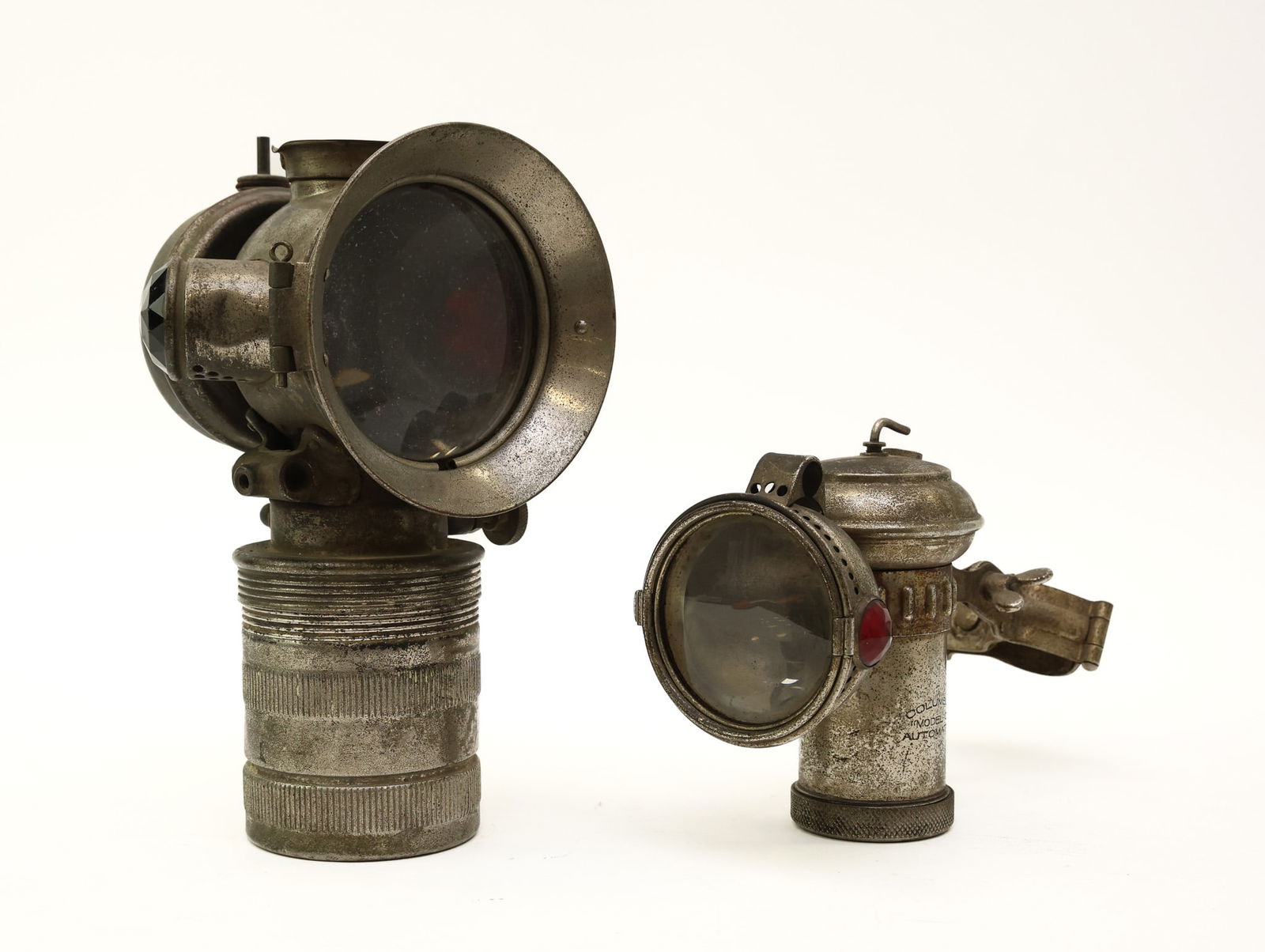 Antique Brass Era Carbide Vehicle/Carriage Lanterns: One Hine-Watt Columbia Model C, and one Solar No. 291 S. Tallest, 9.5"h