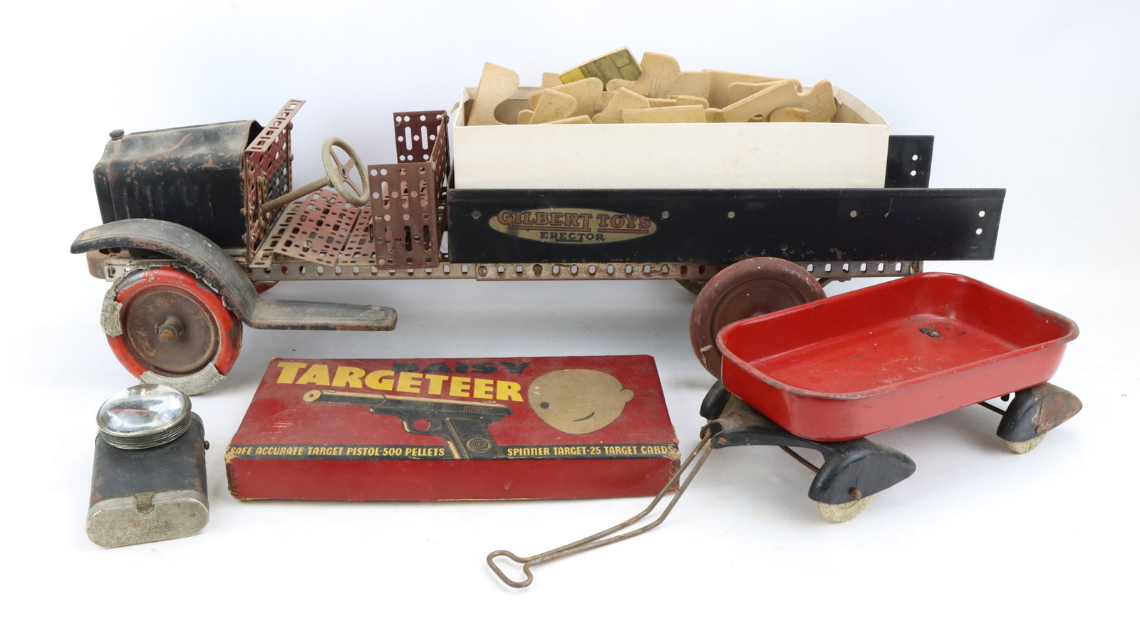 Gilbert Truck, Daisy Targeteer and Wagon: Gilbert Toys erector truck with damaged wheels and paint loss, Daisy Targeteer with targets in original box, red toy wagon and vintage flashlight.