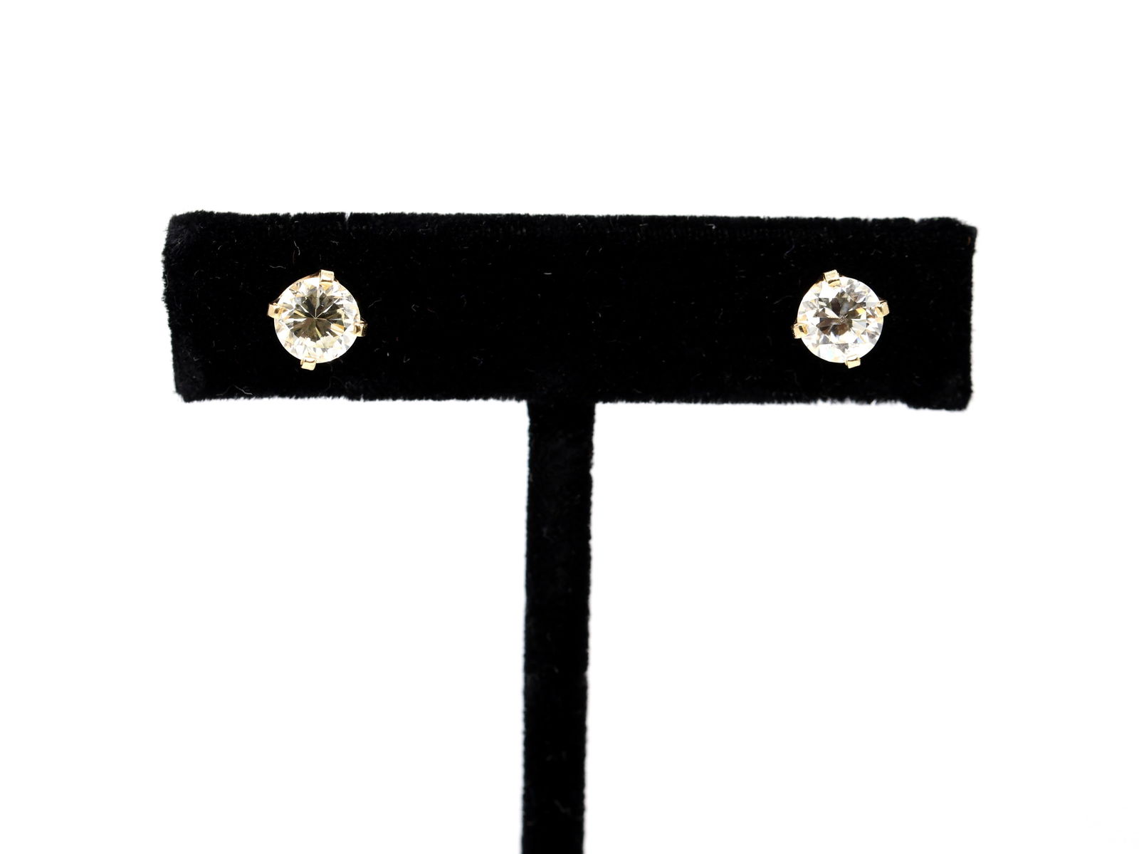 1.2 Carat 14k Diamond Stud Earrings: 14k yellow gold stud earrings set with two round brilliant cut diamonds, approximately 1.20ct each (2.40ct total), SI2–I1 clarity, K/L color, 1.5dwt.