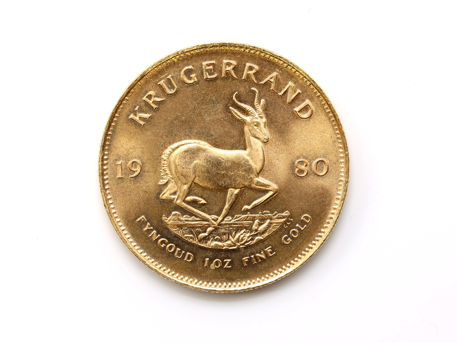 1980 South African Gold Krugerrand: 1980 gold Krugerrand coin weighs 1.09 troy ounces and contains 1.0 troy ounce of gold.