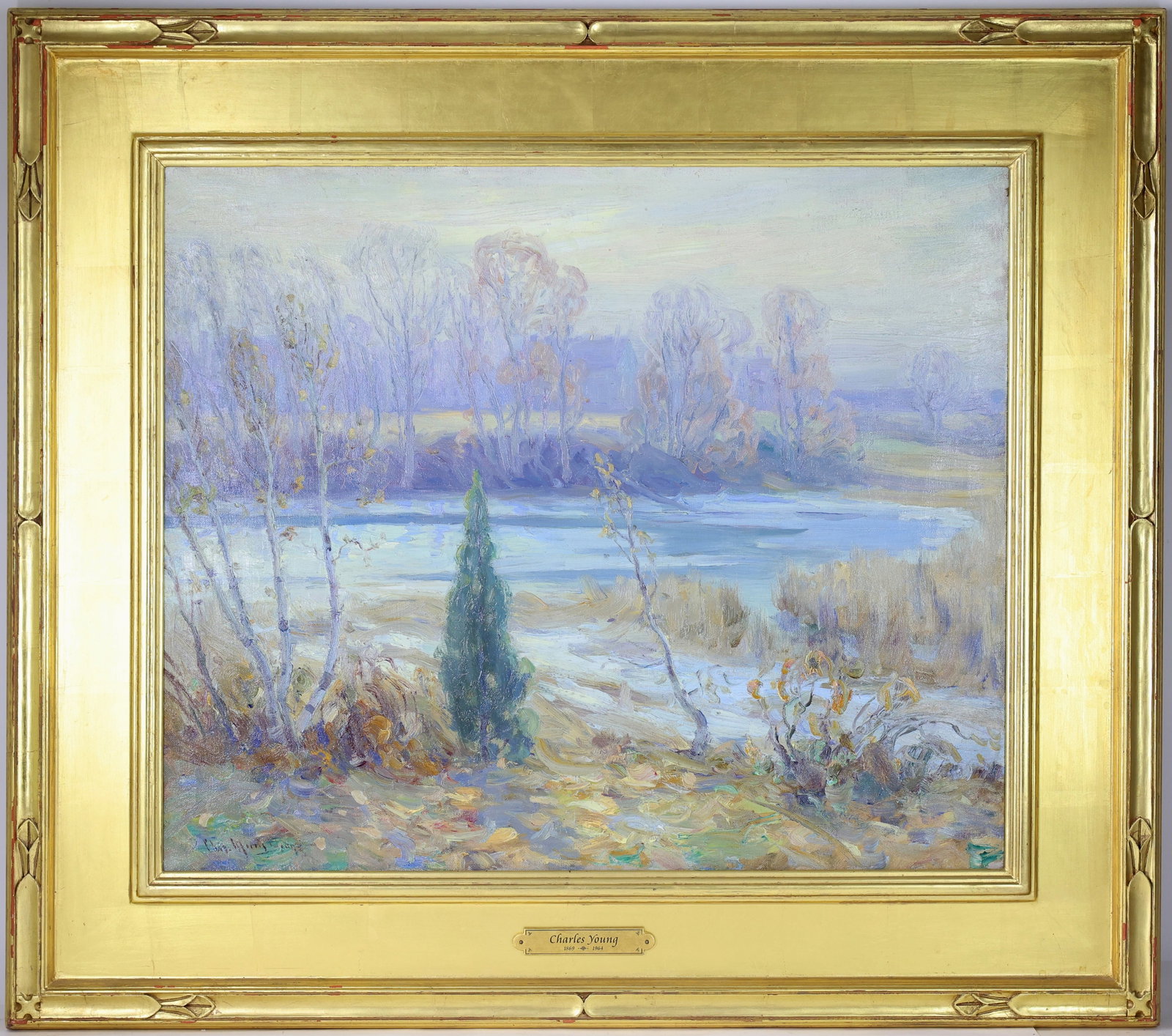 Charles Morris Young (1869 - 1964): Oil on canvas, SLL. Impressionist landscape with a quiet river, bare trees, and soft seasonal colors. 20"h x 24"w and 29"h x 32.5"w framed