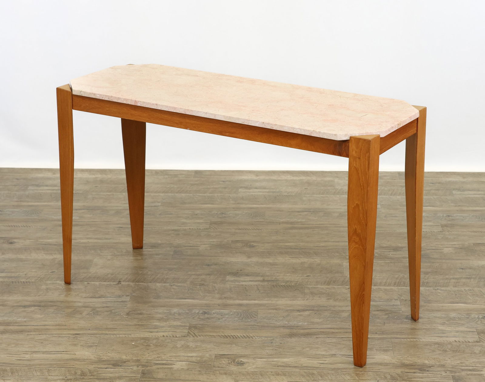 Marble Top Hall Table: Maple table with shaped tapered legs and a fitted rose marble top. 28"h x 45"w x 17"d