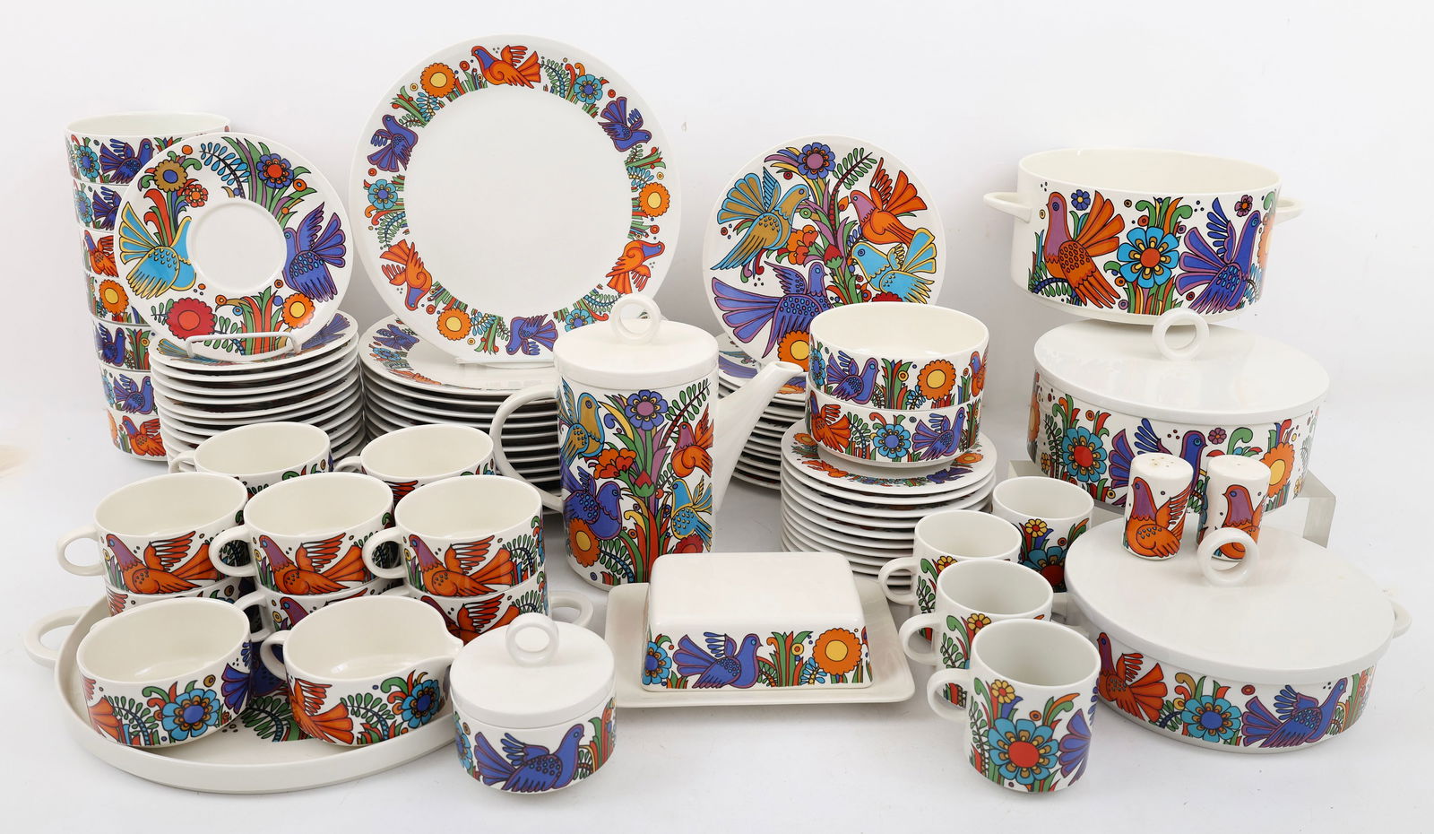 Villeroy & Boch “Acapulco" Dinner & Tea Service: Porcelain dinner and tea service with traditional Mexican folk-art design of brightly colored birds and flowers. Includes 13 dinner plates (10"), 13 luncheon plates (8"), 11 dessert plates (6.25"), 9