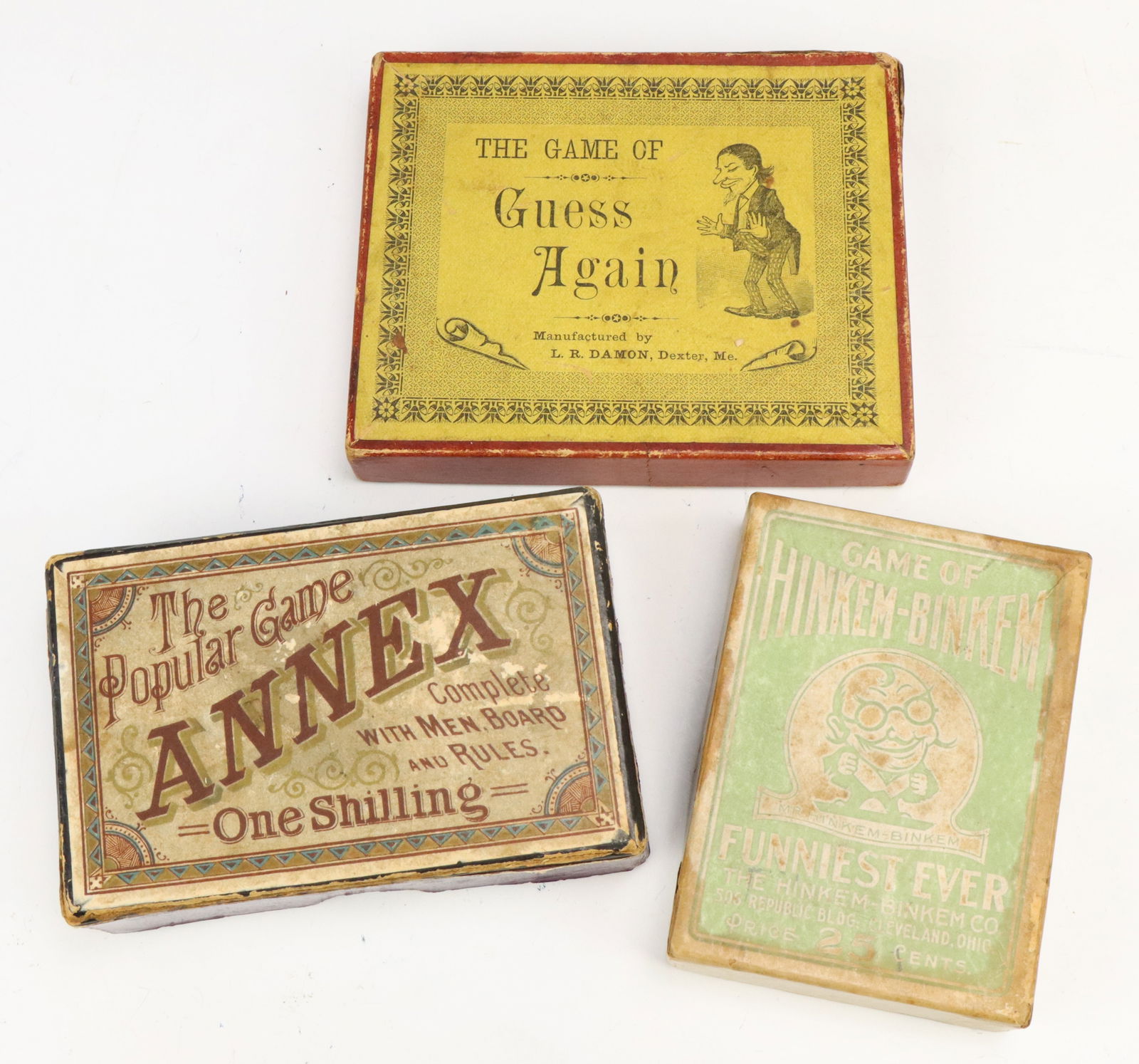Antique Games: The Game of Guess Again, L.R. Damon manufactured, Maine, original box, early 1900's, 0.75”h x 5”w x 4”d. The Popular Game of Annex and The Game of Hinkem-Binkem, original boxes and c