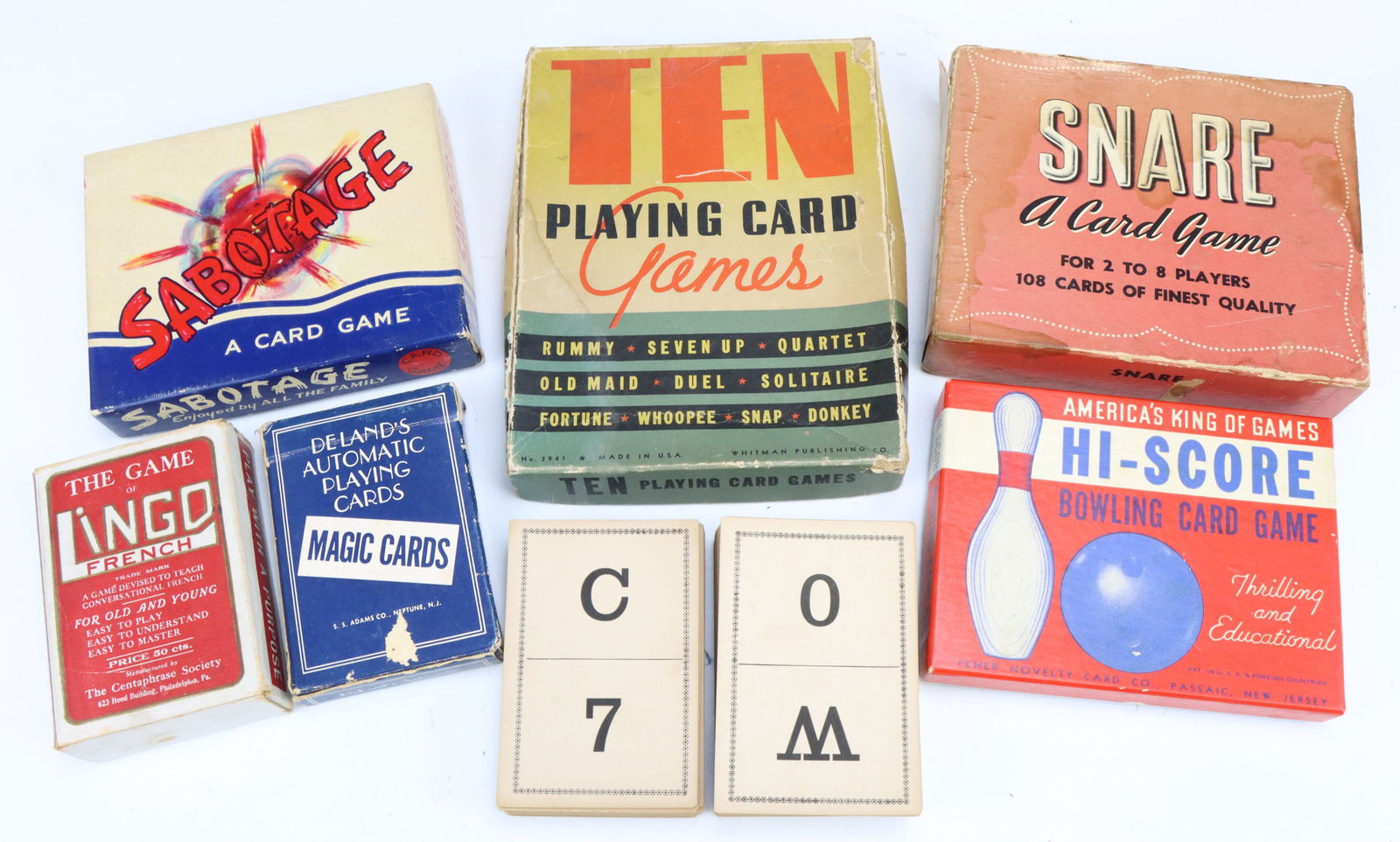 Assorted Vintage Card Games: Assorted vintage educational and card games, includes magic cards and bowling card game, original boxes. Wear from age and play. Ten box 1”h x 5”w x 6.5”d