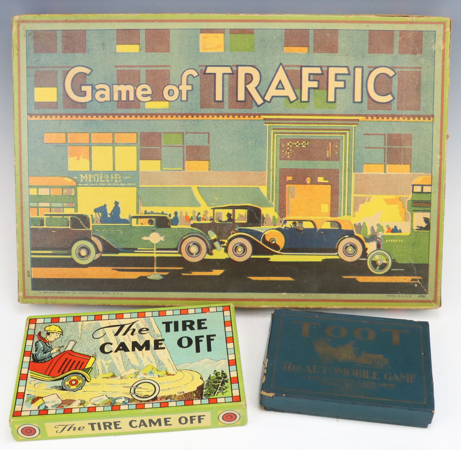 Vintage Board Games: Milton Bradley Game of Traffic board game, post-WWII, original box and game accessories, 1”h x 15.5”w x 10.5”d. Parker Brothers The Tire Came Off game, original box and pieces and To