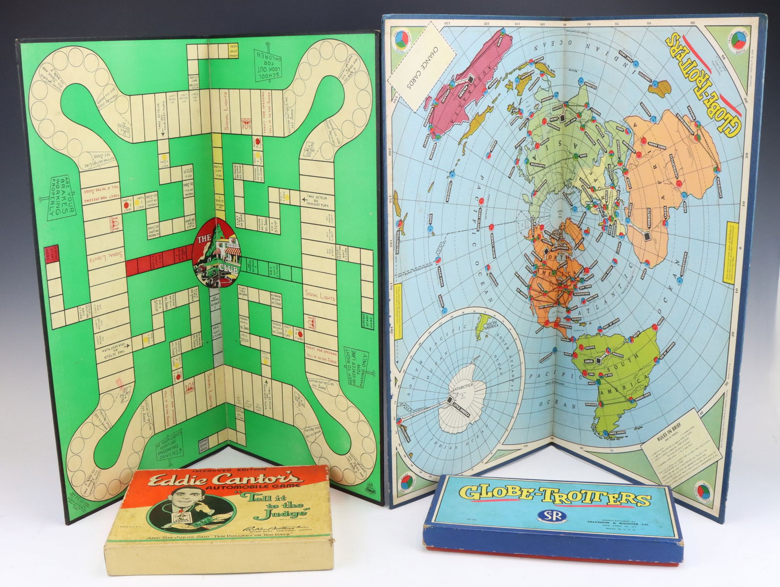 Vintage Travel-Themed Games: Parker Brothers Eddie Cantor's Tell it to the Judge Automobile Game, original game board and game cards and pieces. Selchow & Righter Globe Trotters game, 1950, original board, 10.25”w x 20.5&rd
