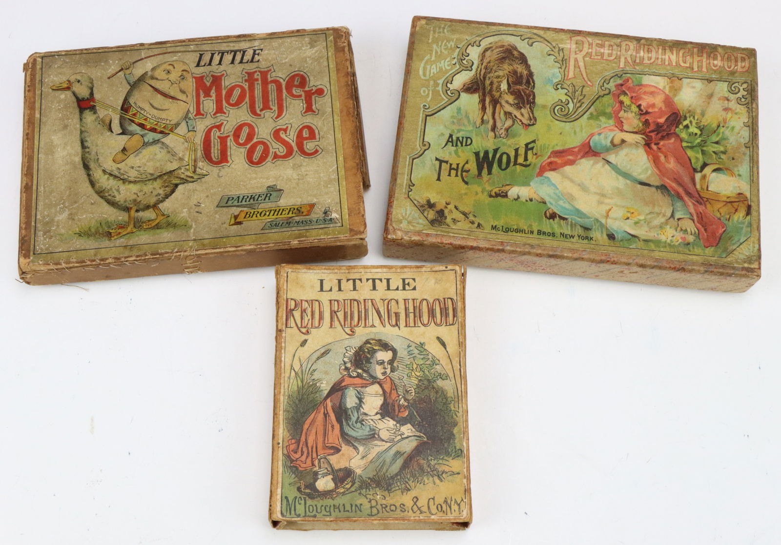Antique Nursery Rhyme Games: Parker Brothers Little Mother Goose game, 1890, original box. Red Riding Hood and the Wolf board game, McLoughlin Brothers, late 1800s, original box. Little Red Riding Hood game, McLoughlin Brothers,