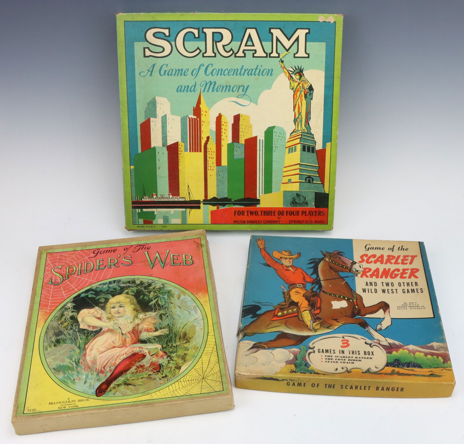 Vintage Board Games: Scrap, A Game of Concentration and Memory by Milton Bradley, Game of Spider's Web by Milton Bradley/McLoughlin Bros and Game of the Scarlet Ranger by Whitman publishing, 1942. All include original box