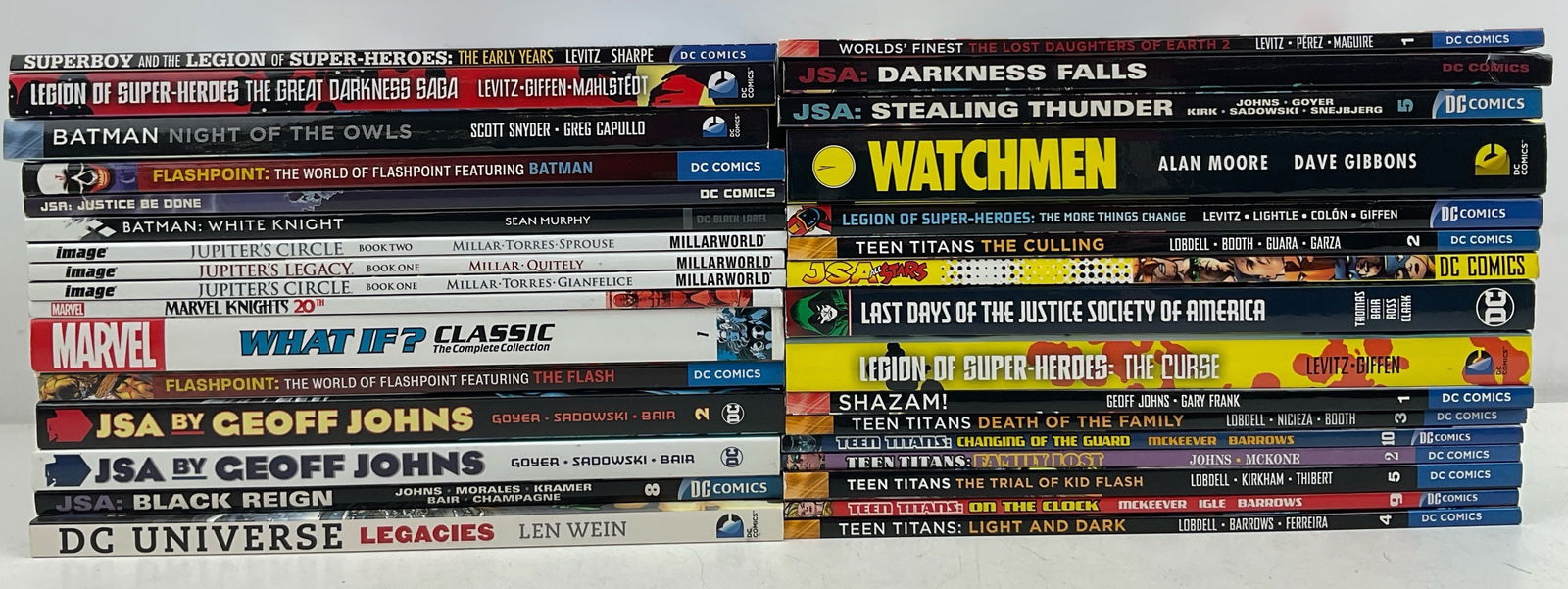 Comic Related Books: DC and Marvel comic collector books covering various comic series and characters.