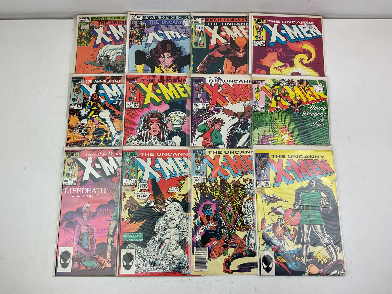 Uncanny X-Men Comics: (12) assorted Marvel Comics Uncanny X-Men #s ranging from #165-#197. Condition varies.