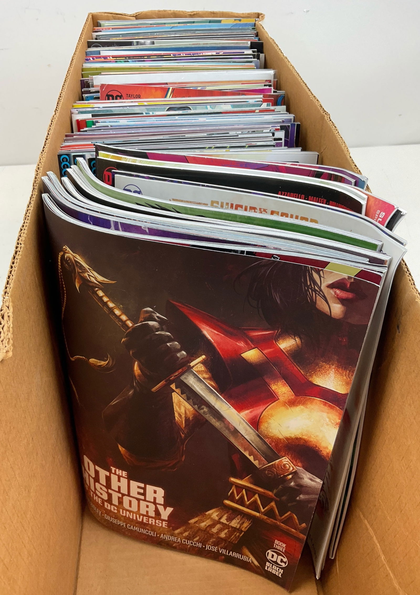 DC Comic Book Assortment: Assorted DC Comics including Supergirl, Task Force Z, Teen Justice and more. Condition varies.