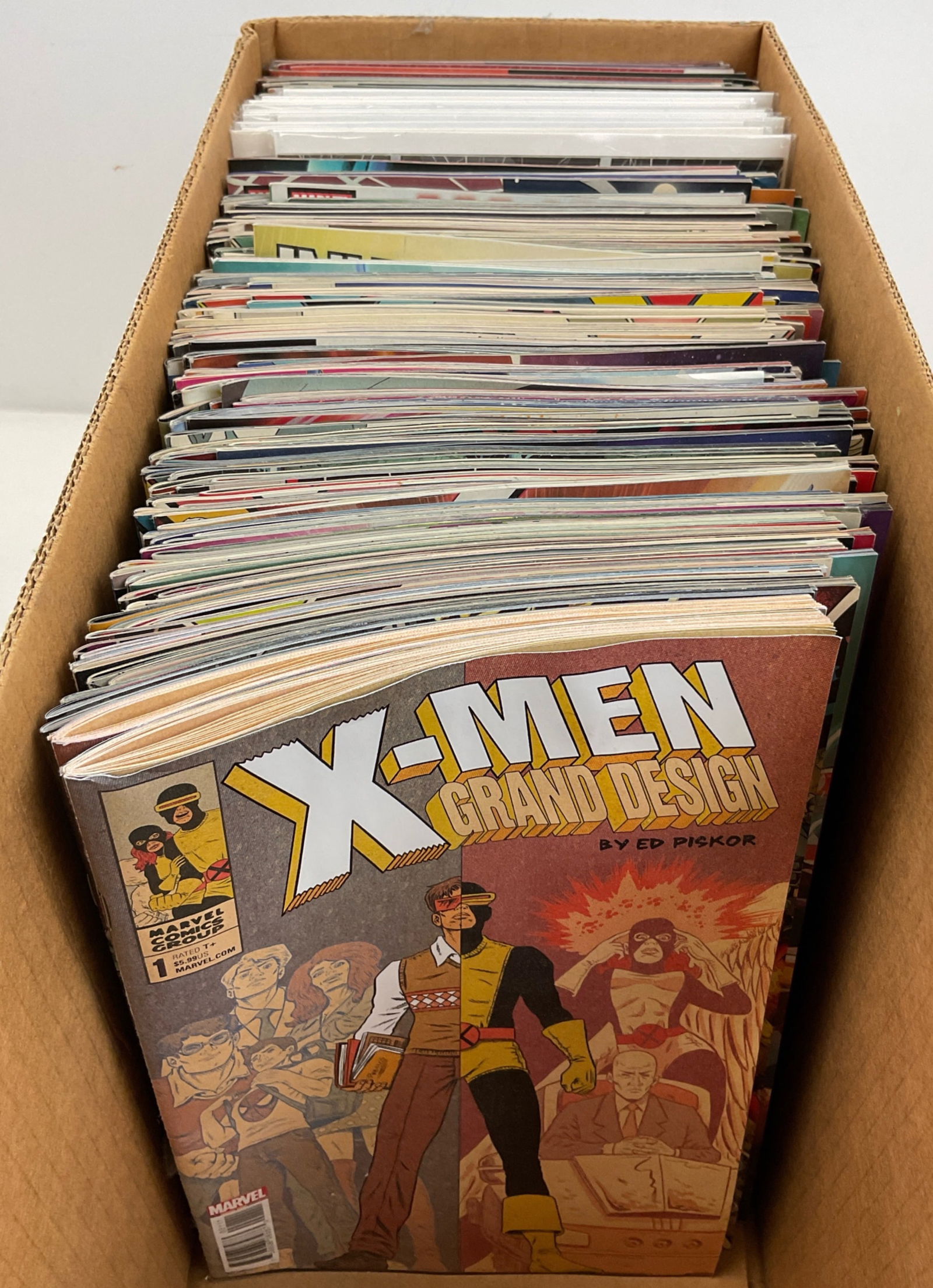Marvel Comic Book Assortment: Assorted Marvel Comics including X-Men, Cable, Domino, Legion, Old Man Logan and more. Condition varies.