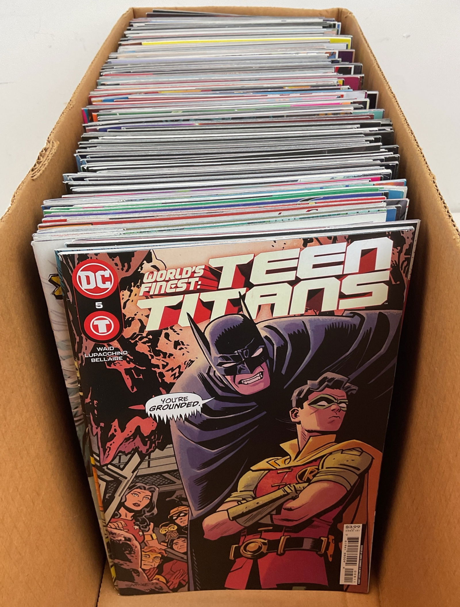 DC Comic Book Assortment: Assorted DC Comics including Teen Titans, Poison Ivy, Batgirls, Flash and more. Condition varies.