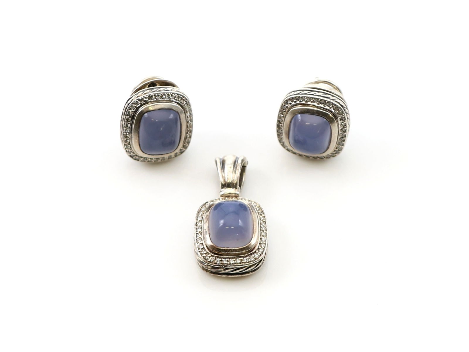 David Yurman Sterling Silver Pendant and Earrings: David Yurman sterling silver "Albion" or "Shrimp" earrings and pendant with chalcedony cabochons and RBC diamonds, approx. .70 ct for the earrings and .35ct for the pendant. Earrings .95" and pendant