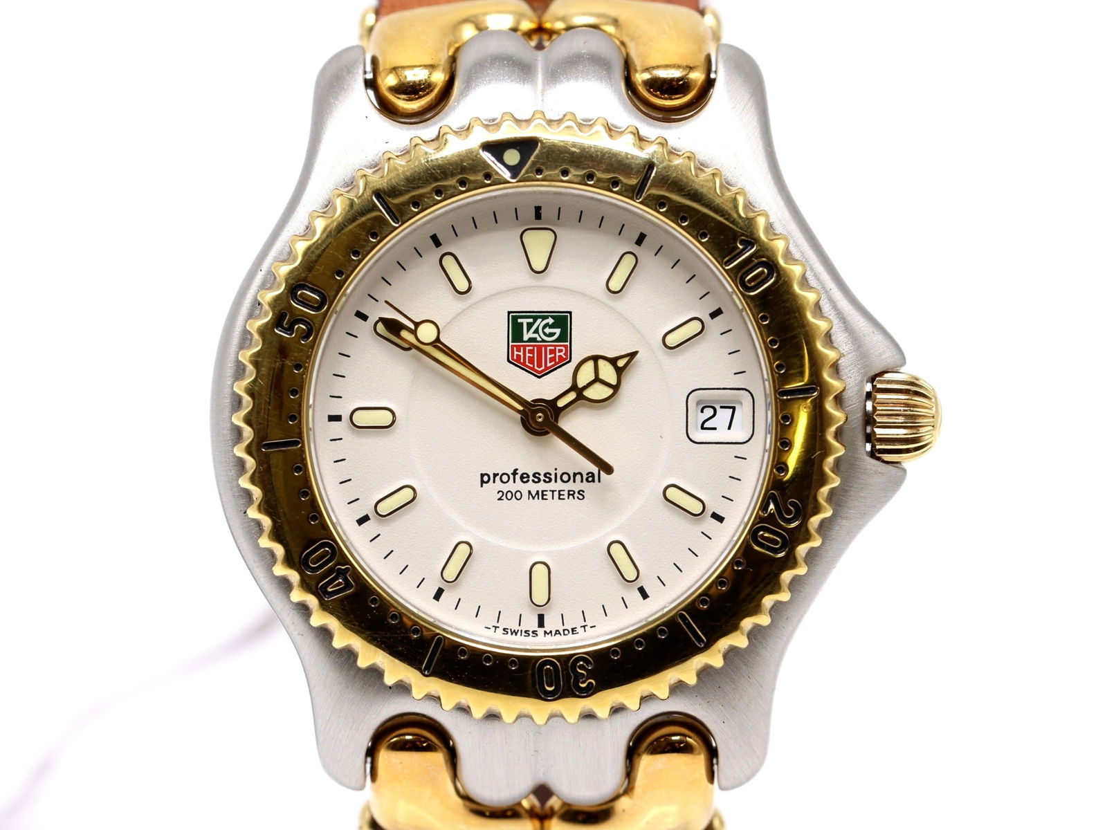 TAG Heuer SEL Wristwatch, ref.WG1122-K0: TAG Heuer S/el WG1122-K0 quartz wristwatch with white dial, luminous indices and hands, date at 3 o’clock, gold-plated bezel, stainless steel and gold-plated case and bracelet, approx. 38mm case