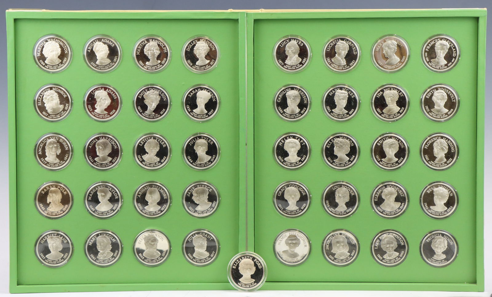 Franklin Mint Sterling Silver First Ladies of the US Medals: First Ladies of the United States set, (41) sterling silver medals, mintage of 10,286, issued 1971-1974, in cabinet style album with plastic capsules (the Elizabeth Ford metal does not fit the