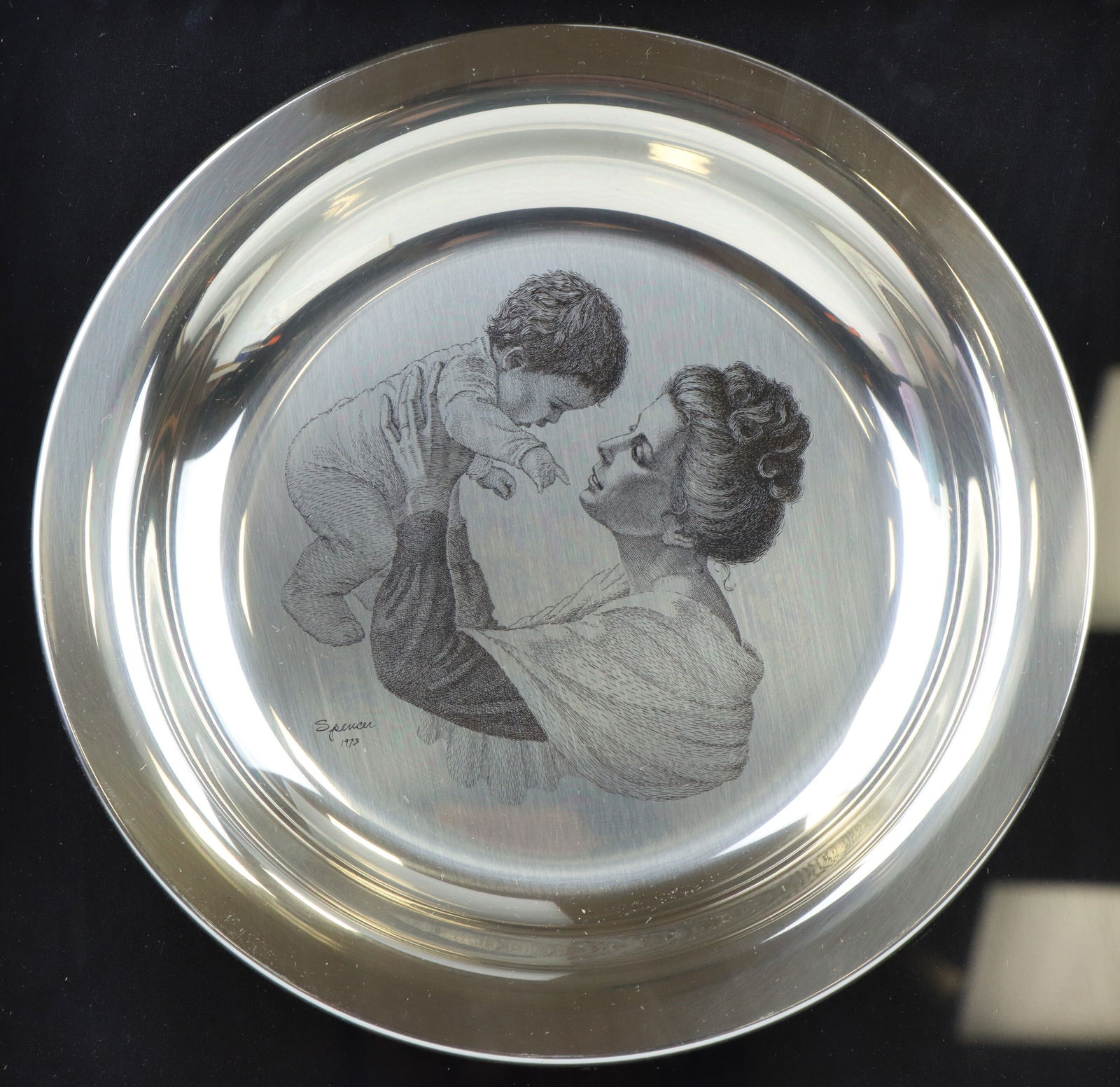 Franklin Mint Sterling Silver Mother and Child Plate: Mother and Child by Irene Spencer sterling silver Mother's Day Plate 1973, mounted in a shadow box frame. Includes paperwork. 8"w, and 6.15 ozt