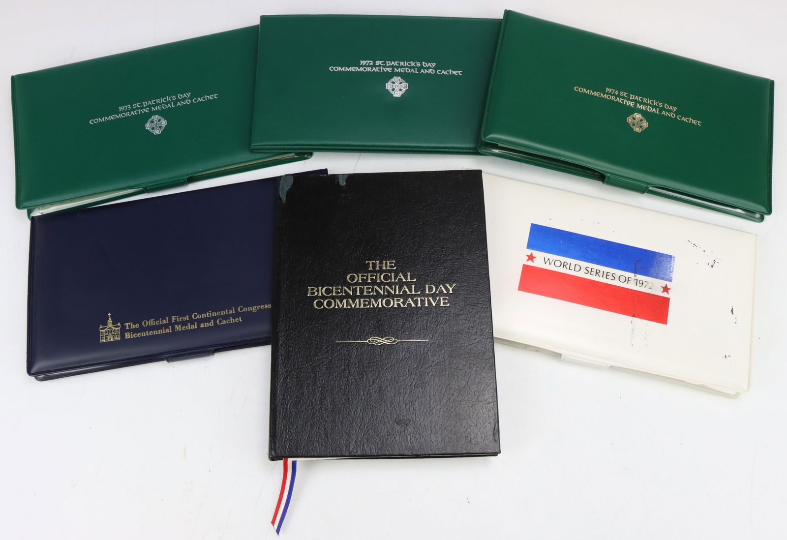 Franklin Mint Fine and Sterling Silver Medals: St. Patrick's Day Commemorative Medals and Cachets, (3) fine silver medals mounted in cards with first day covers, 1972-74, each approx 38 mm and 0.8 ozt. World Series of 1972 sterling silver medal