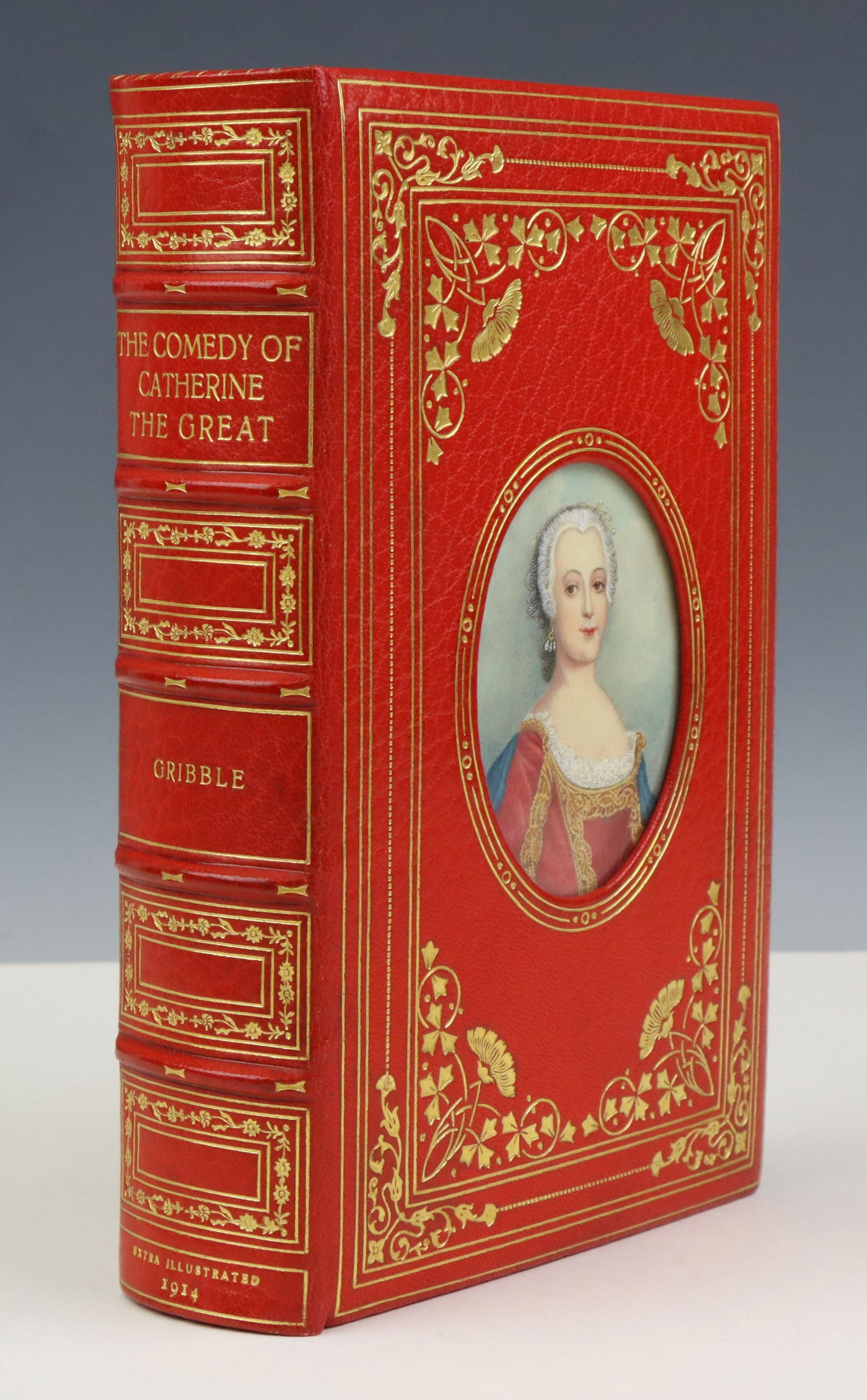 Catherine The Great-Fine Binding with Miniature: Book titled "The Comedy of Catherine the Great" by Francis Henry Gribble, published by G.P. Putnam's Sons, New York, 1912. Book is octavo in size and presents full red Moroccan binding with gilt decor