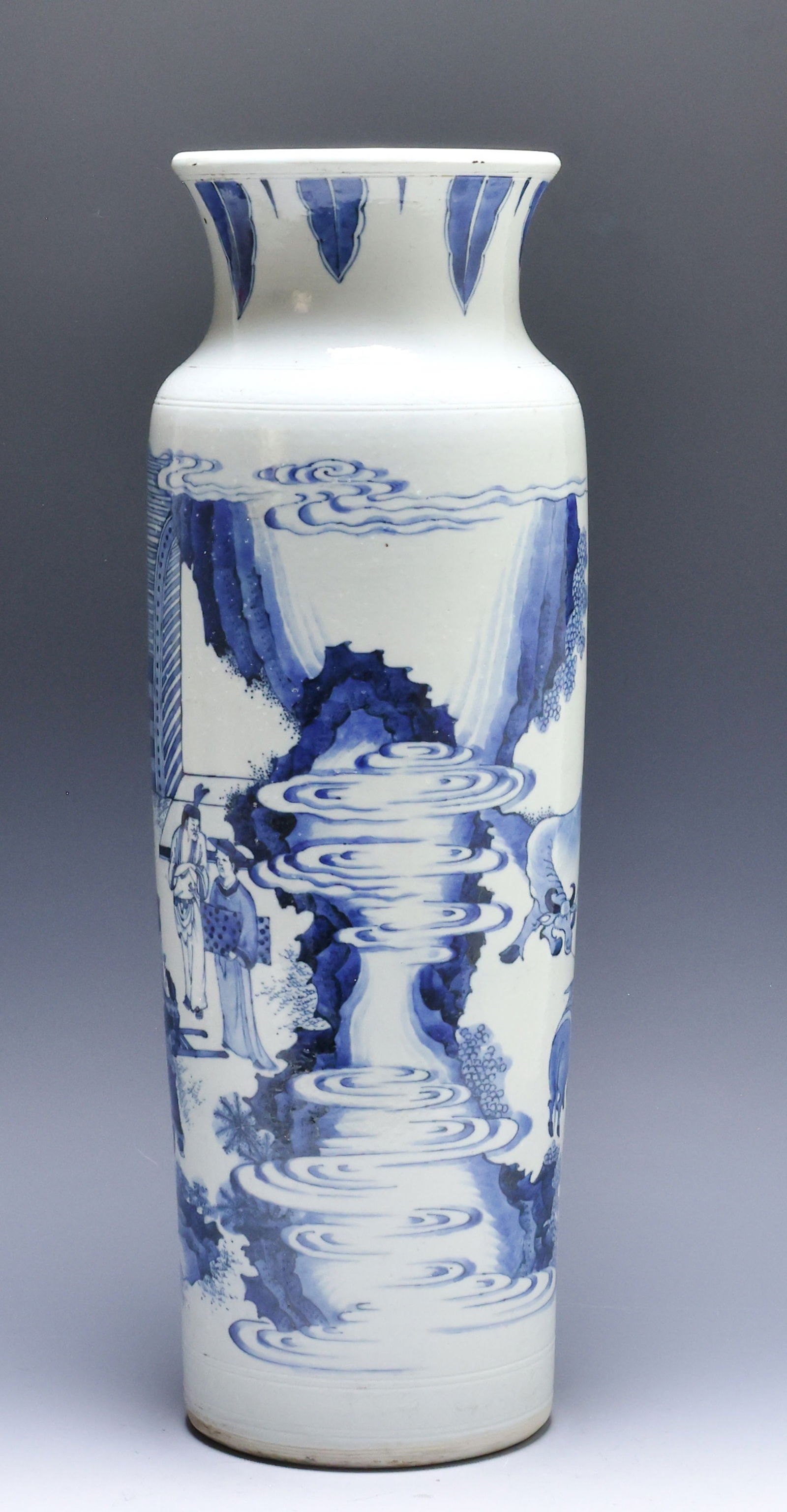 Chinese Transitional Porcelain Sleeve Vase: Transitional era blue and white sleeve vase depicting the story of Bing Ji and the buffalo from the Hanshu (Book of Han), featuring an impressed band to the base with a geometric motif and another to