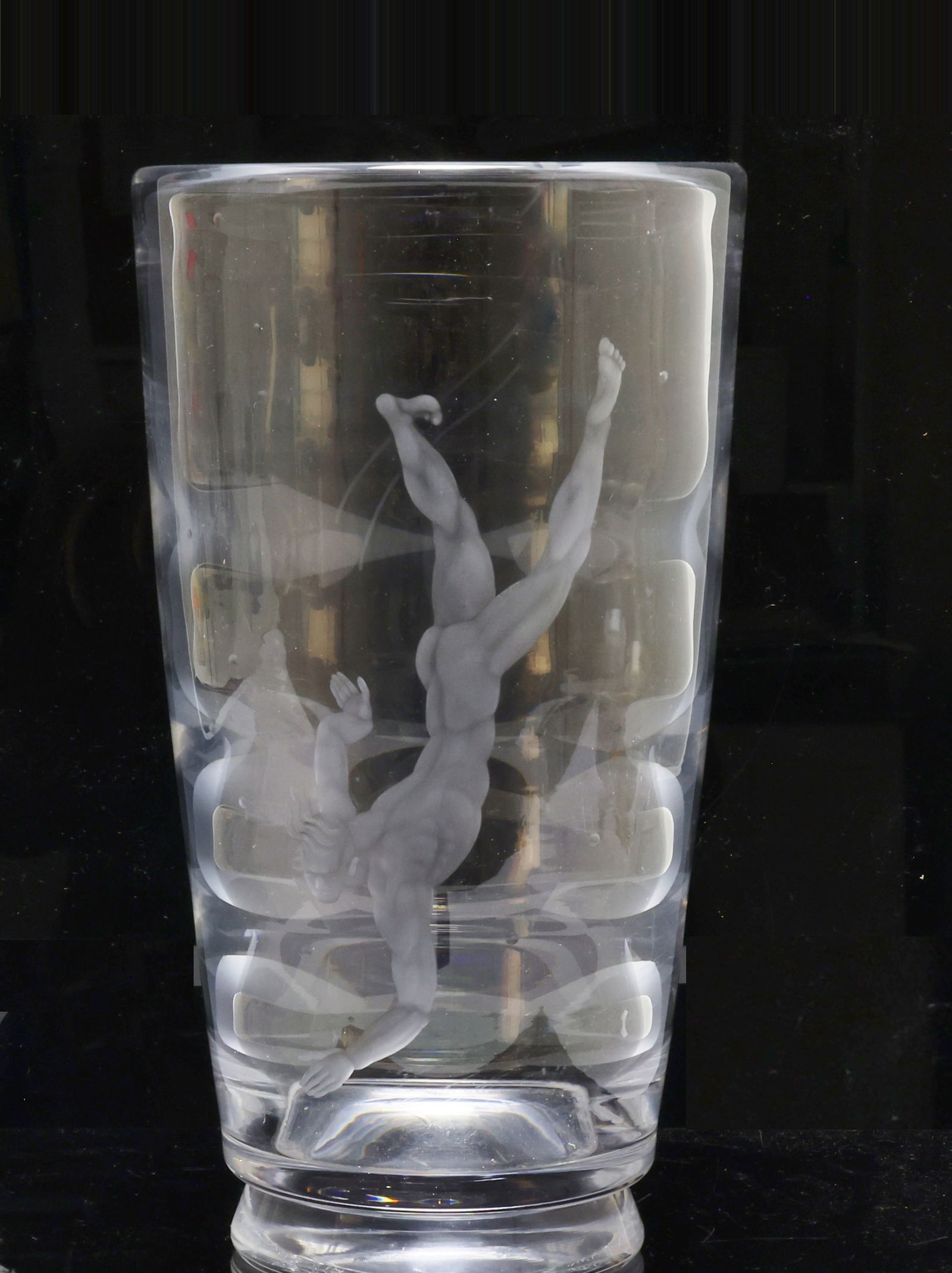 Vicke Lindstrand for Orrefors "Pearl Diver" Vase: Swedish Art Deco crystal vase, the exterior with an etched nude pearl diver and bubbles, the interior with an undulating surface which is intended to imitate water. Marked for Lindstrand and Orrefors,