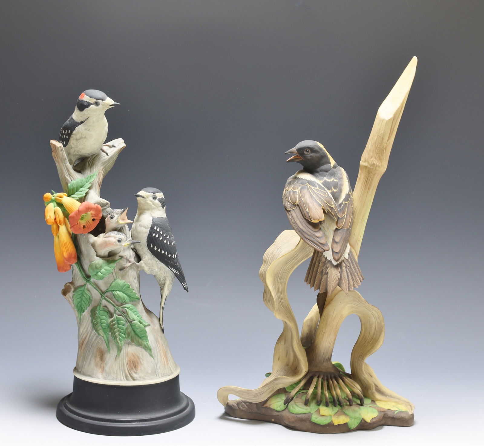 Boehm Porcelain Birds: Boehm birds, including "Downy Woodpeckers", no. 427E, and "Bobolink (Dolychonyx Oryzivorus)", no. 475R. (2) sculptures. 13"h x 6"w x 6.75"d, and 15"h x 8"w x 5.5"d