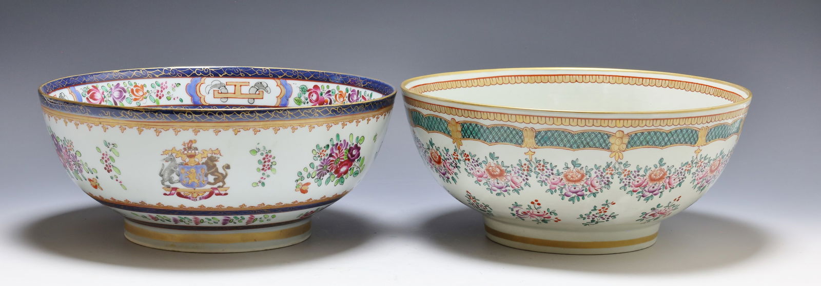 Edme Samson Porcelain Chinoisserie Punch Bowls: 19th C. French porcelain punch bowls with Chinese export style floral and geometric decoration, one example with a Samson mark to the foot, the other example featuring a coat of arms with the motto