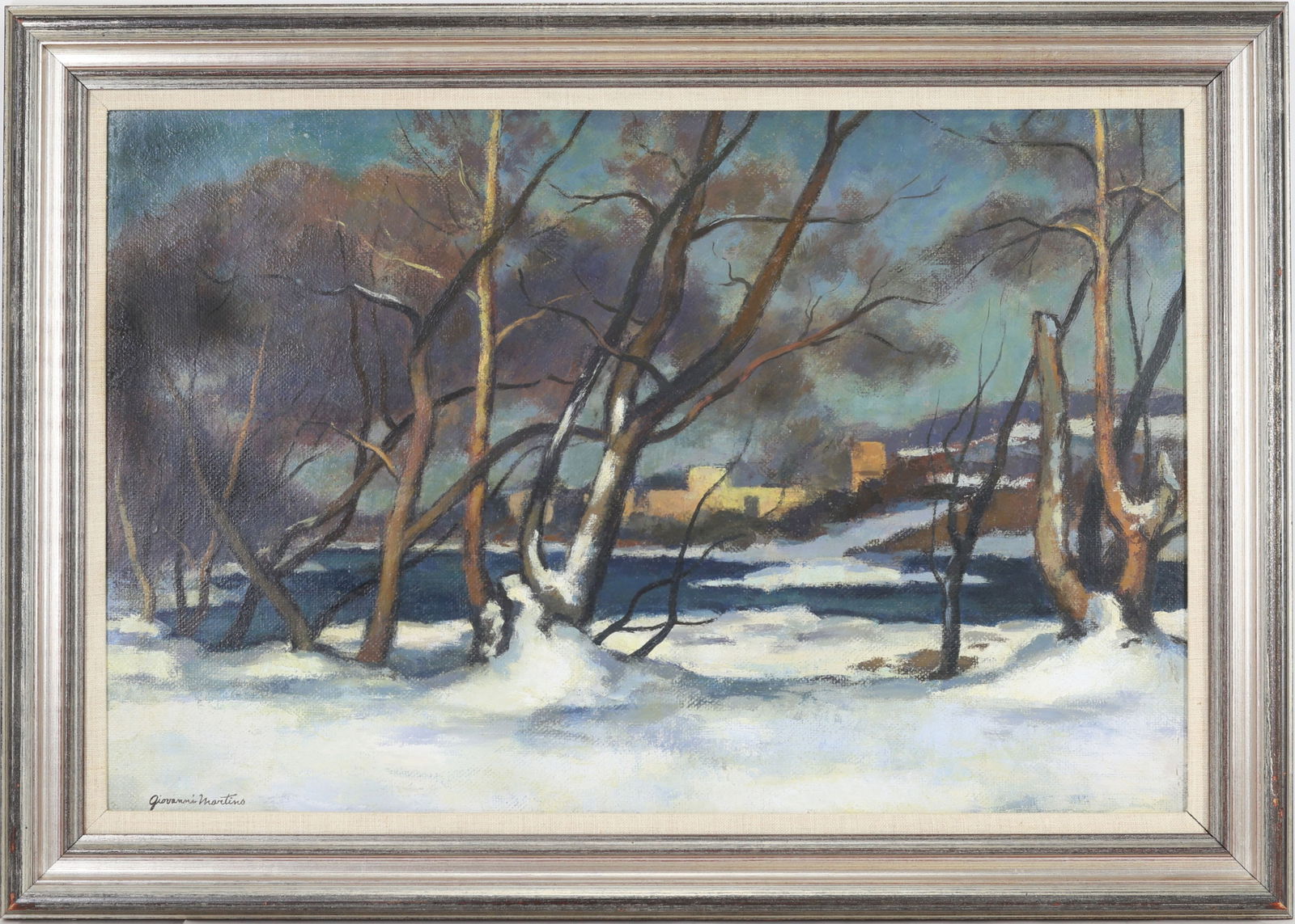 Giovanni Martino (1908 - 1997): Oil on board, SLL, Winter landscape depicting bare trees along a snow covered riverbank, with distant buildings across the water. 16"h x 24"w and 20"h x 27"w framed