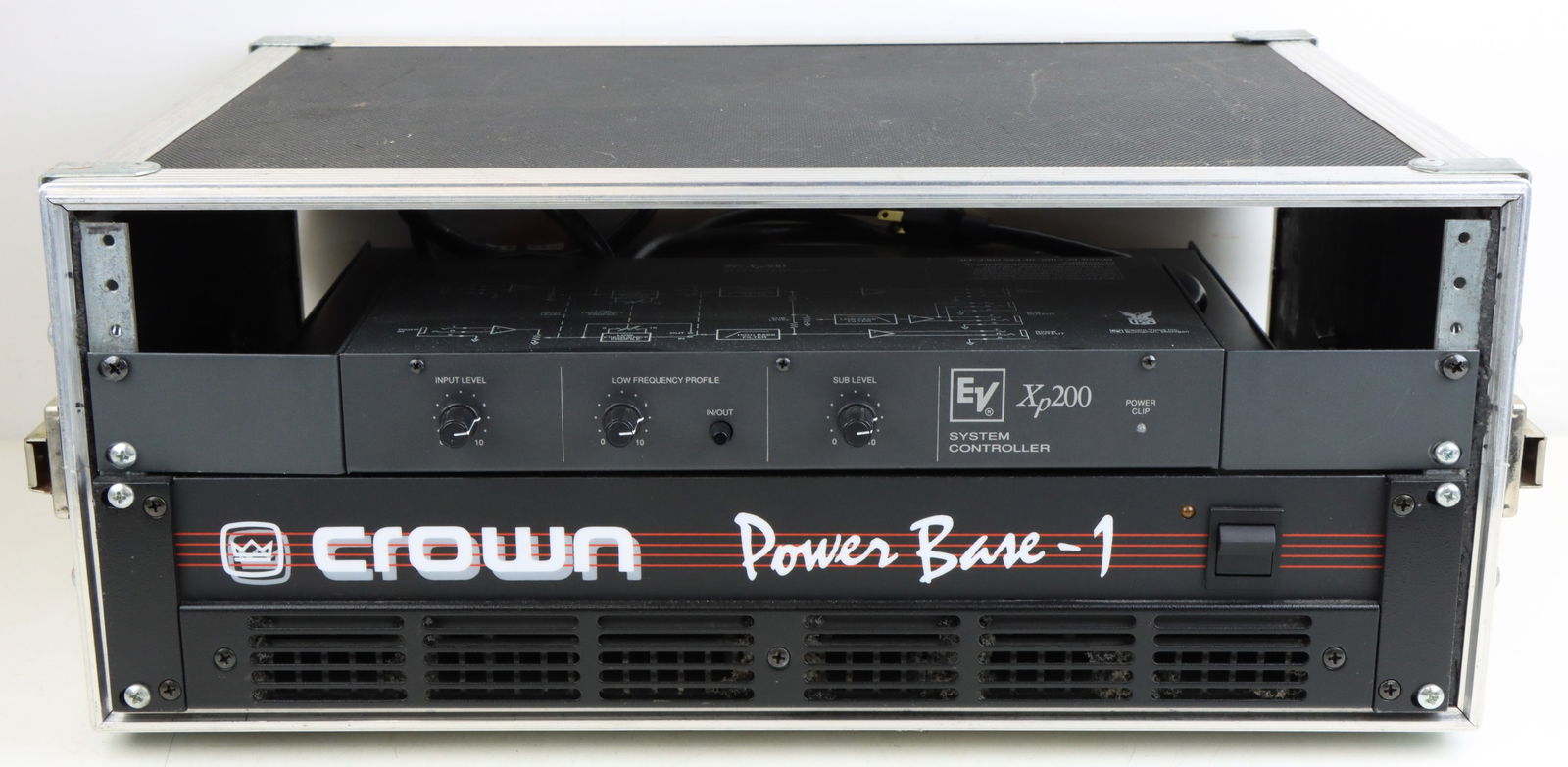 Crown Power Amplifier: Crown Power Base 1. 230W per channel. 4ohms. Powers on and mounted in portable road case. Also includes EV XP200 System Controller. All mounted in Sam Ash road case. Case measures 8.5"h x 19.5"w x 20"