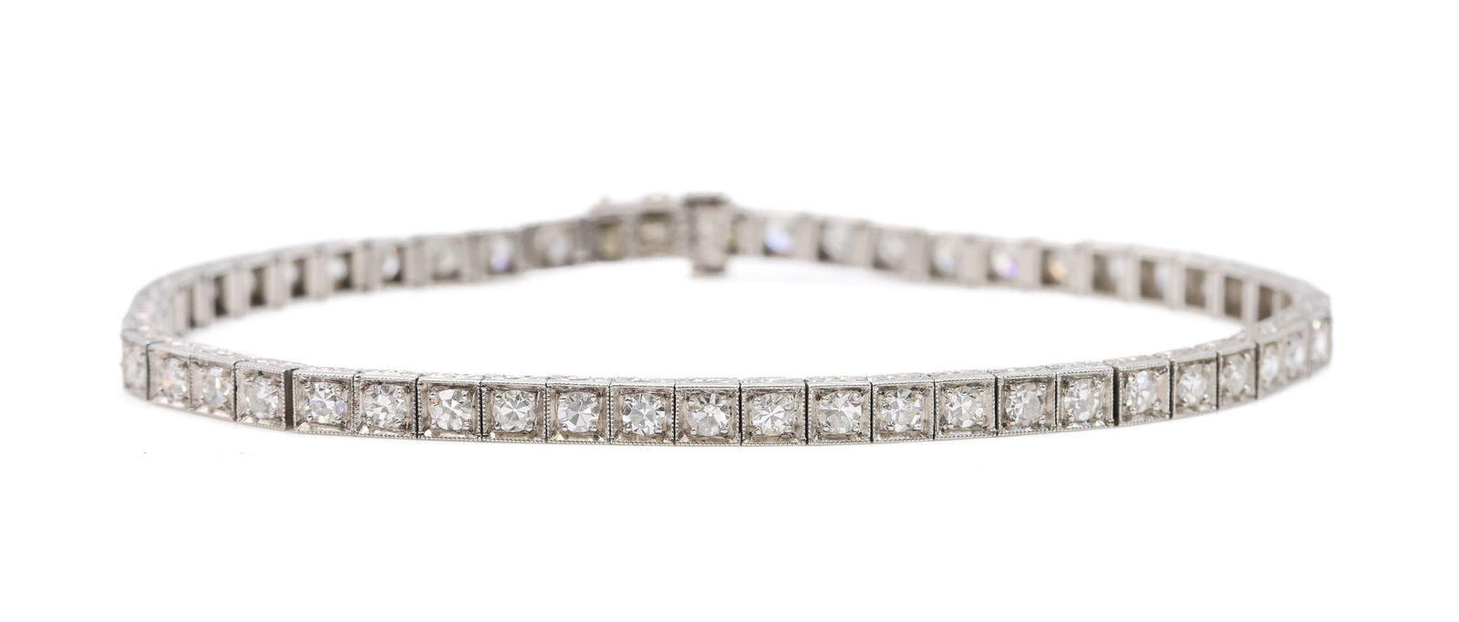 Black, Starr & Frost Platinum Diamond Line Bracelet: Platinum Black, Starr & Frost diamond line bracelet set with (50) round cut diamonds totaling approximately 2.50 carats, 7" and 9.0dwt.