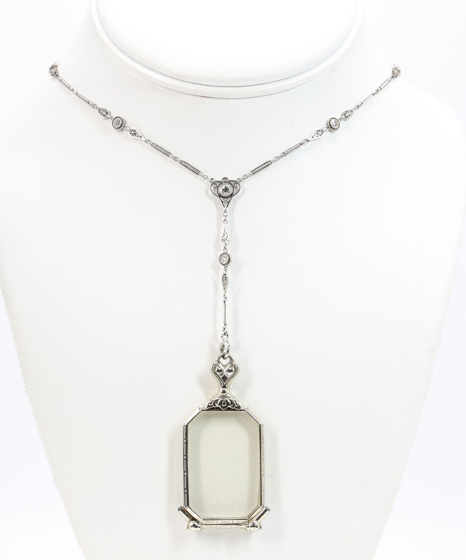 Platinum and 14k WG Diamond Necklace and Lorgnette: Art Deco platinum diamond necklace suspending a 14k white gold lorgnette pendant, set with approximately 0.60 carats of round diamonds in openwork and filigree links, 24" long, 12.9 dwt.
