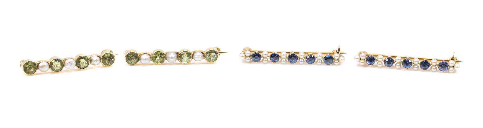 14k YG Sapphire and Peridot Pins: (2) 14k yellow gold bar pins including one set with alternating round cut sapphires measuring approx. 2.7 mm and seed pearls, 1.125" and 2.2 dwt; and one set with alternating round cut peridots