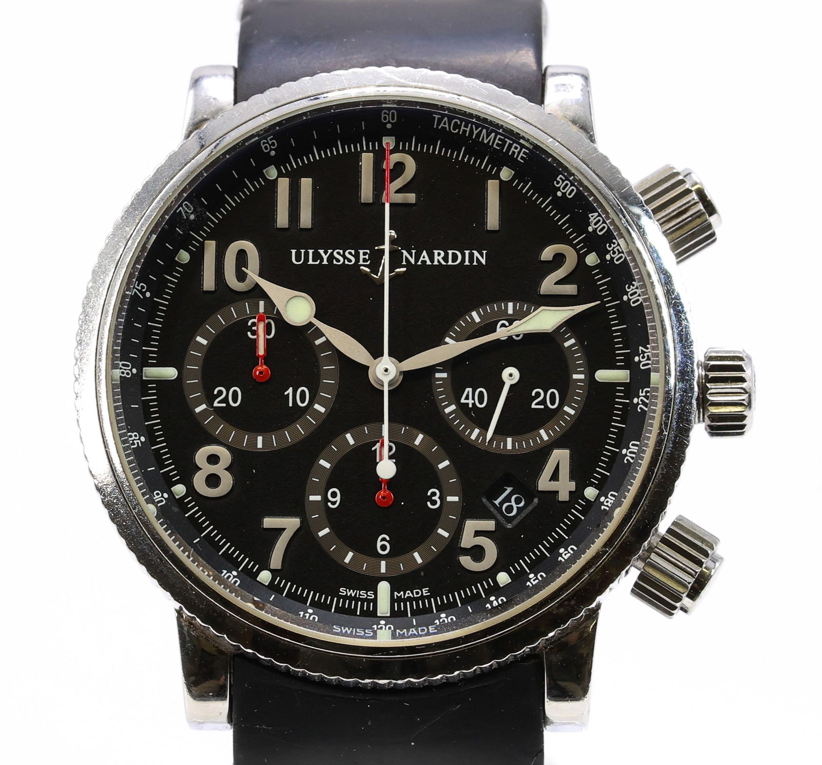 Ulysse Nardin Marine Chronograph, Ref. 353-88, Automatic Wristwatch: Stainless steel case, 40 mm, with coin-edge rotating bezel and black dial featuring luminous Arabic numerals, three recessed chronograph registers with red accents, outer tachymeter scale, and date