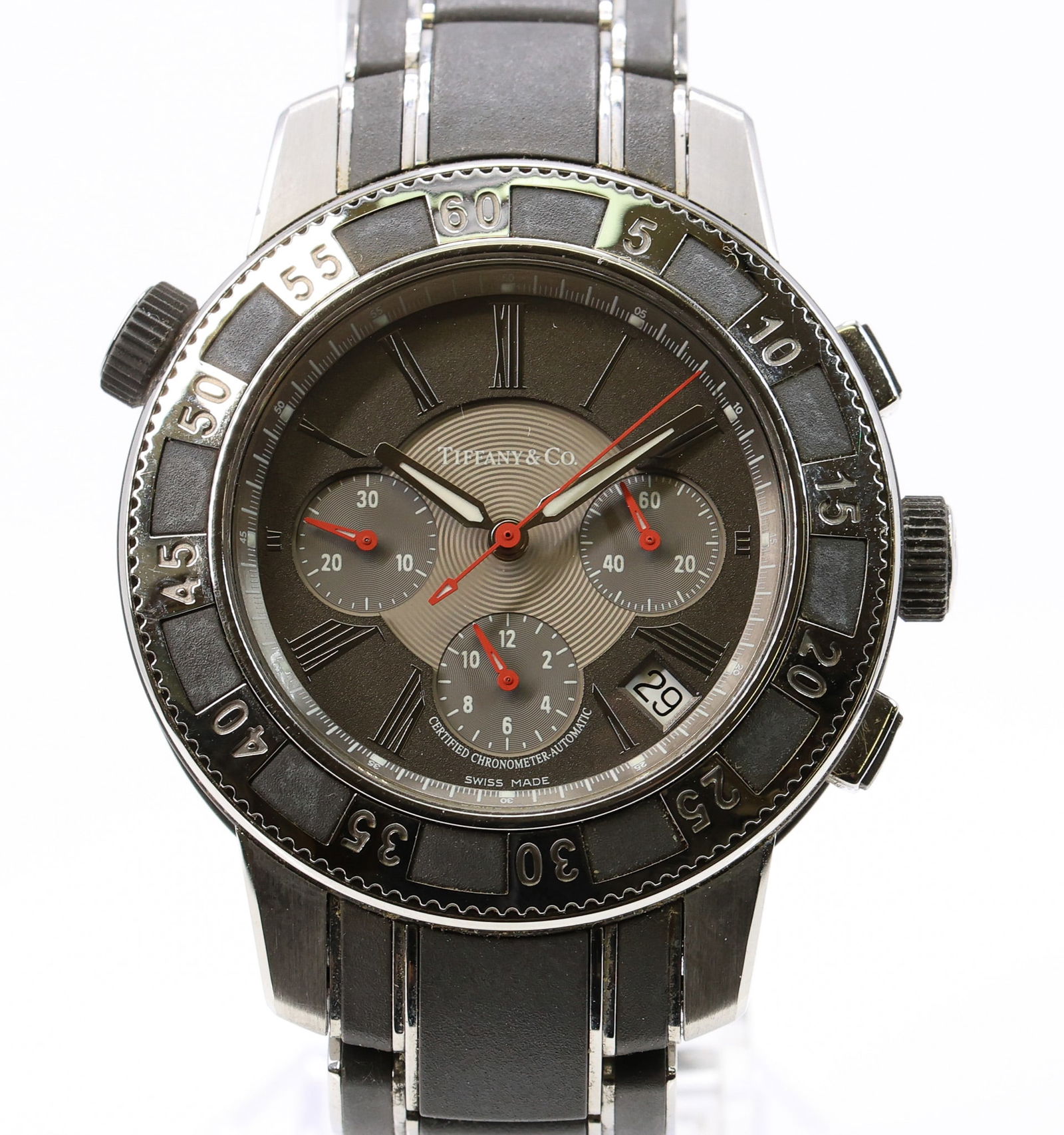 Tiffany & Co. Chronograph, Ref. T-57, Automatic Wristwatch: Stainless steel case, 42 mm, with unidirectional rotating bezel and screw down chronograph pushers. Grey multi level dial with applied Roman numeral markers, luminous hands, three recessed