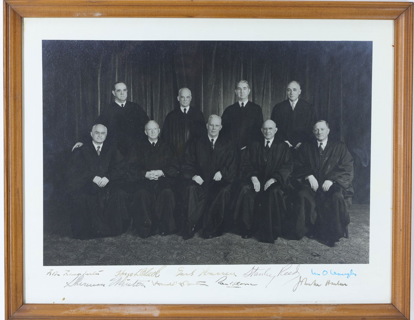 Autographed Photograph of the 1955/56 United States Supreme Court: Large United States Supreme Court photograph taken in the 1955 to 1956 time frame autographed by all Associate Justices and Chief Justice Earl Warren who were serving at that time. Photograph shows Ju