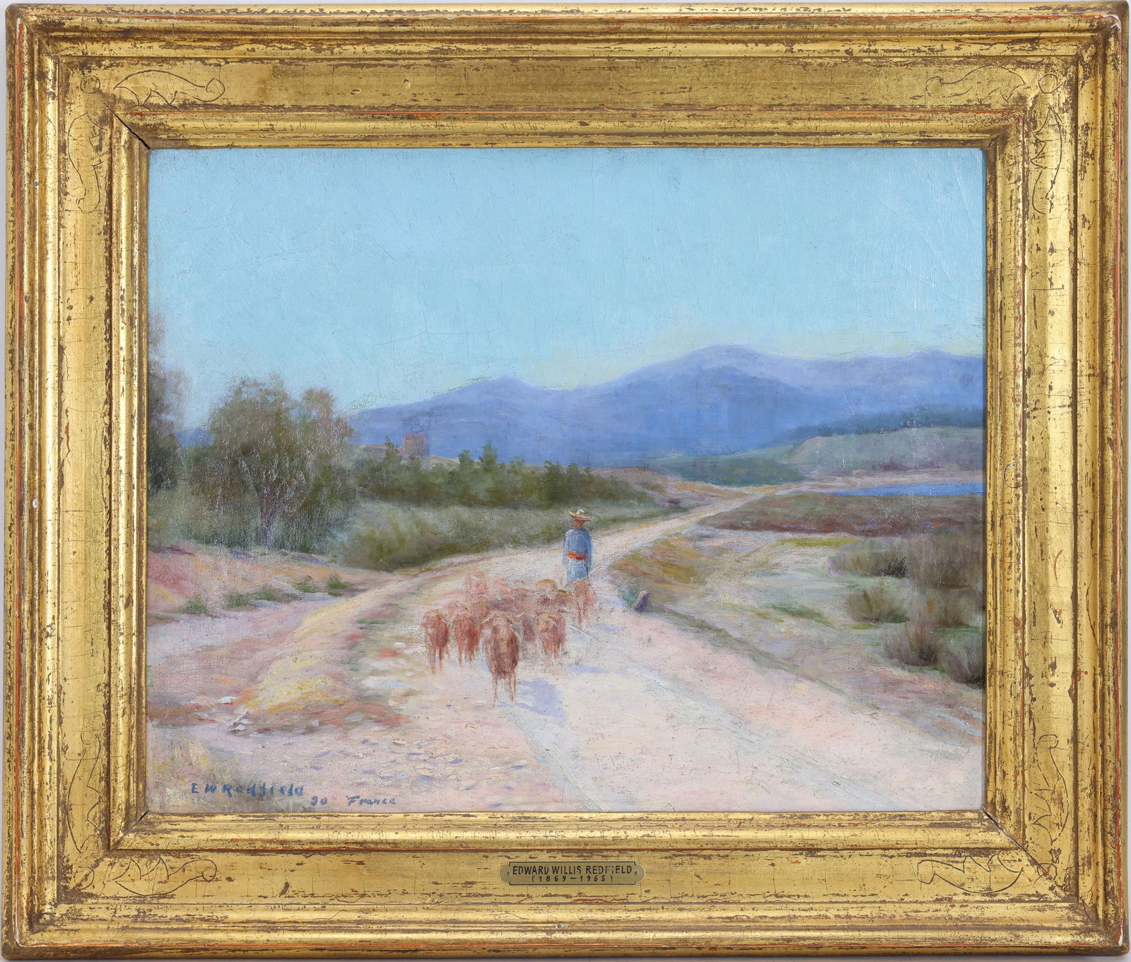 Edward Willis Redfield (1869 - 1965): Oil on canvas, "France", SDLL '90. Impressionist pastoral scene with a shepherd herding sheep along a path. Provenance: Rago Arts. 14"h x 17.5"w and 19.5"h x 23"w framed