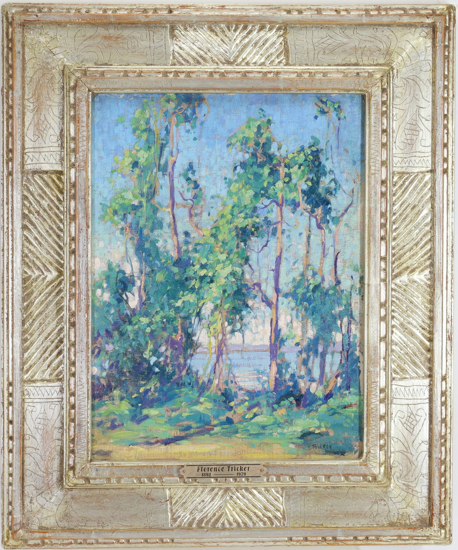 Florence Tricker (1892 - 1979): oil on board, SCR, Impressionist woodland landscape with slender trees and distant water seen through the foliage. 15.75”h x 11.75”w and 23”h x 19”w unsigned hand carved frame.