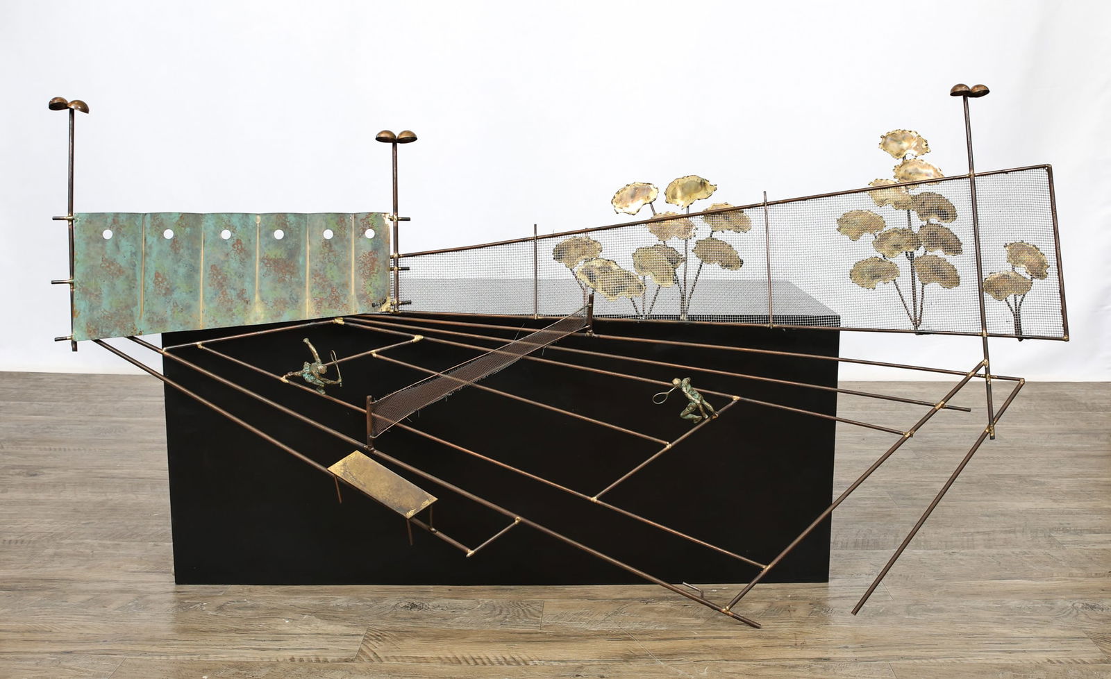 Curtis Jere Tennis Wall Sculpture: Mixed metal wall sculpture of players in a tennis court. Hand signed. 30"h x 53"w