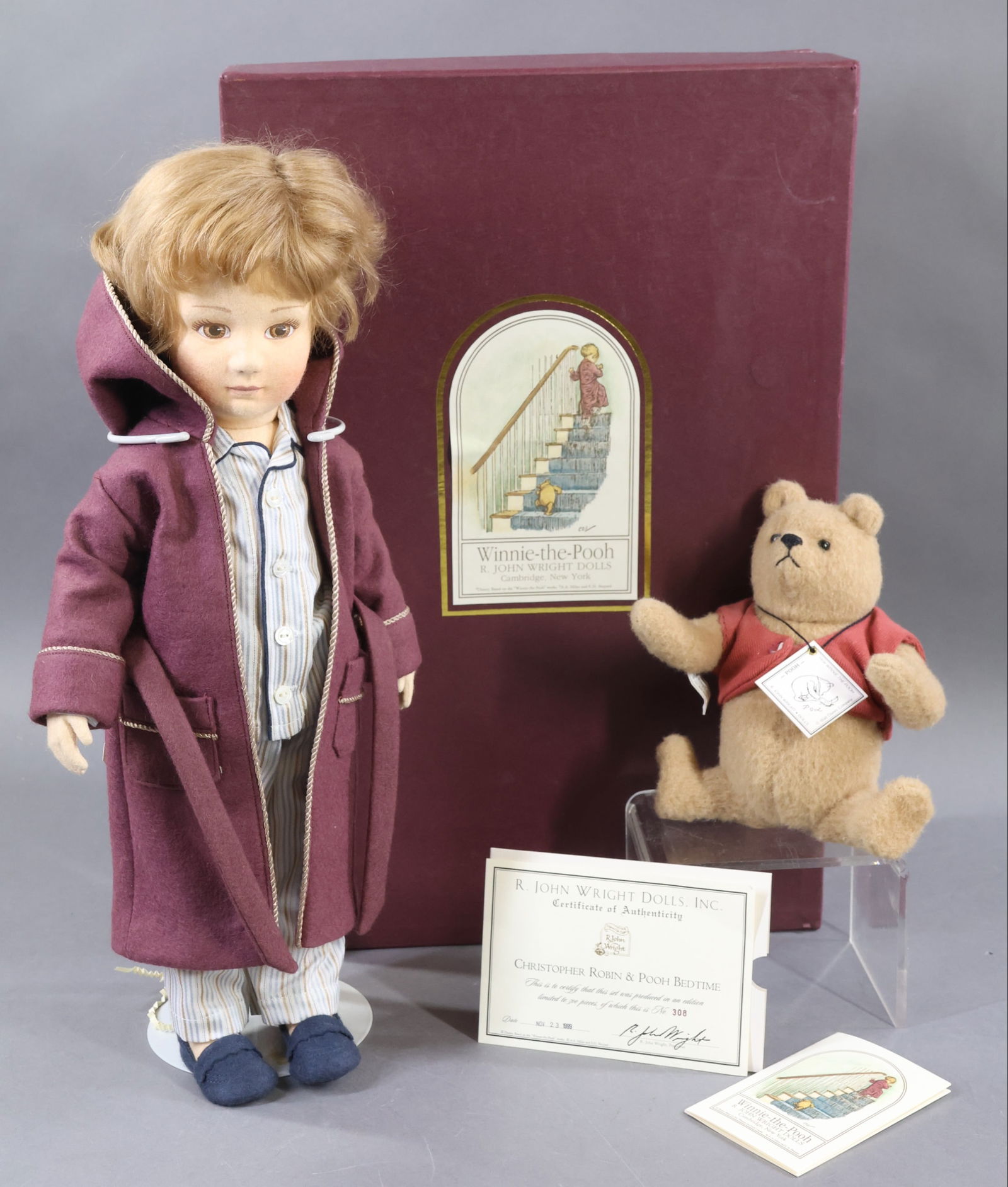 R. JOHN WRIGHT.: MIB 1999 set of Winnie-The-Pooh: "Christopher Robin & Pooh Bedtime", 308/500. COA. Condition: box lid has minor age wear. This lot is being sold AS IS.
