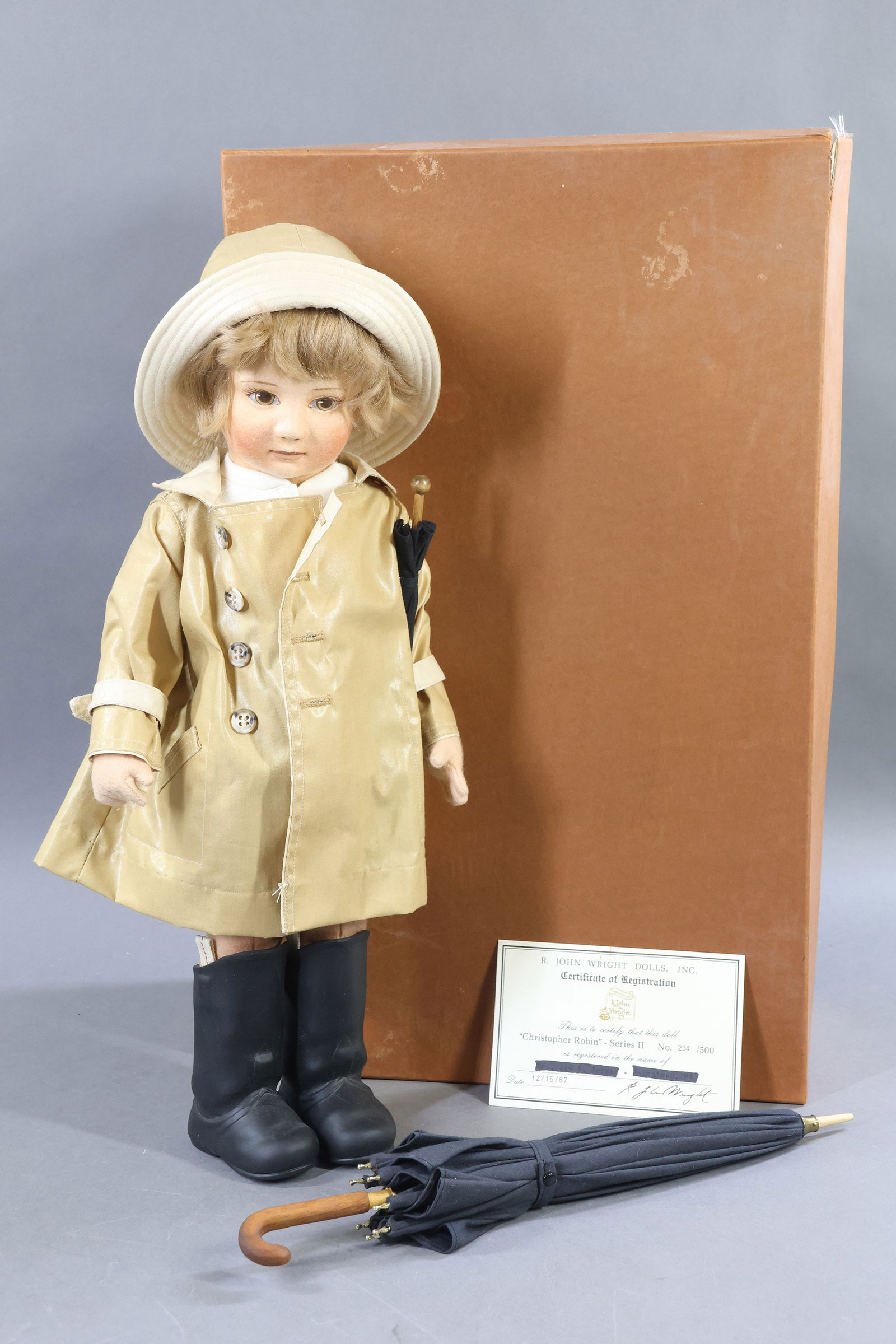 R. JOHN WRIGHT.: 18" 1987 "Christopher Robin" - Series II in OB. 234/500. COA. Condition: age loss on box. This lot is being sold AS IS.
