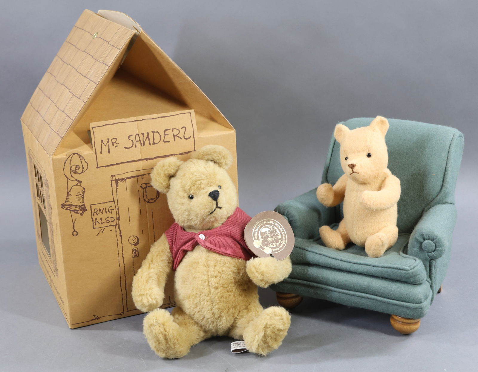 R. JOHN WRIGHT.: LOT. 10" 1989 "Winnie-The-Pooh & His Favorite Chair". This was made exclusively for Walt Disney World Doll and Teddy Bear Convention, Orlando, Florida. 115/500. Hang tag is signed by R. John Wright.