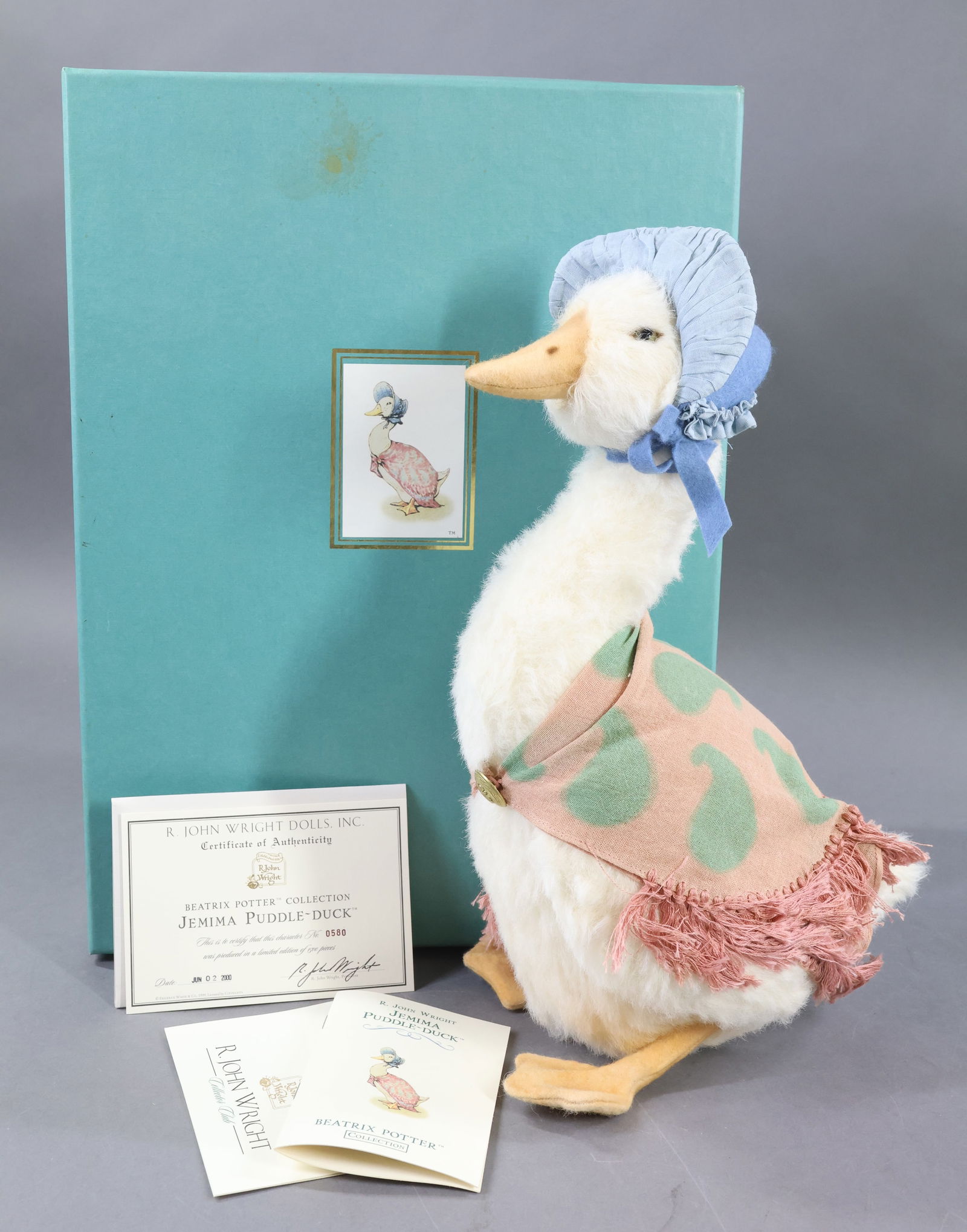 R. JOHN WRIGHT.: BEATRIX POTTER COLLECTION. 15" 2000 "Jemima Puddle-Duck" in OB. 0580/1500. COA. Condition: Duck is MINT. Box has minor age discoloration. This lot is being sold AS IS.