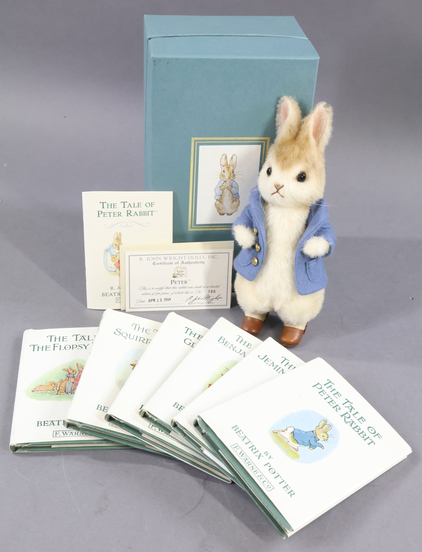 R. JOHN WRIGHT.: BEATRIX POTTER COLLECTION. LOT. 9" 2004 "Peter", OB. 180/500. COA. Condition: Peter is MINT. Box lid has age discoloration. Also - lot of (6) Beatrix Potter books: "Tale of Peter Rabbit", "Tale of